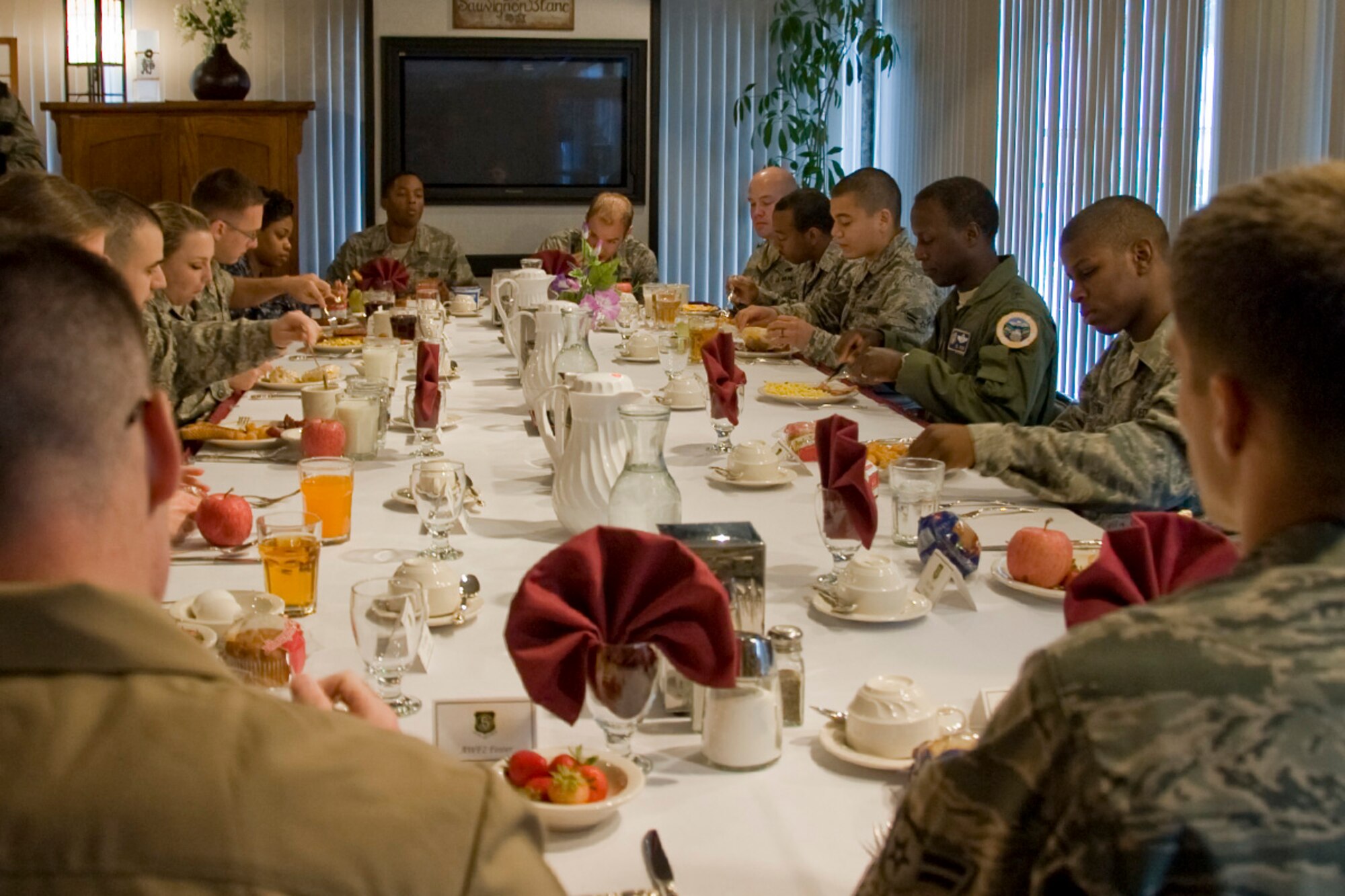MISAWA AB, Japan--Lt. Gen. Edward Rice Jr., U.S. Forces Japan and 5th Air Force commander, has breakfast with Airmen and Sailors at the Grissom Dinning Facility, June 29. General Rice asked Airmen for their inputs on training, changes with their duty station and quality of life. (U.S. Air Force photo/Staff Sgt. Araceli Alarcon) 
