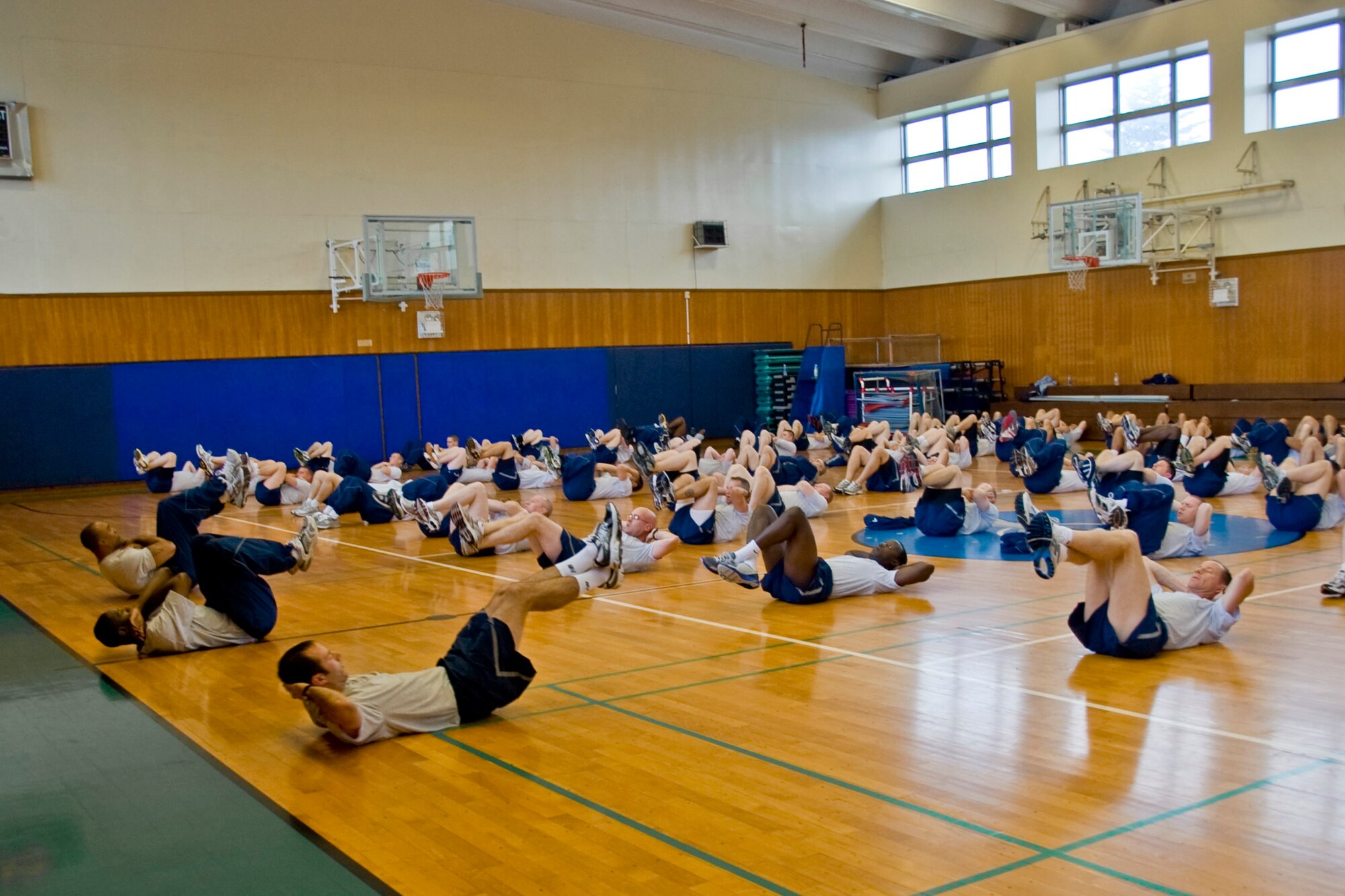 MISAWA AB, Japan--Lt. Gen. Edward Rice Jr., U.S. Forces Japan and 5th Air Force commander, participates in physical training with Airmen of the 35th Civil Engineering Squadron at the Potter Fitness Center, June 28. (U.S. Air Force photo/Staff Sgt. Araceli Alarcon) 