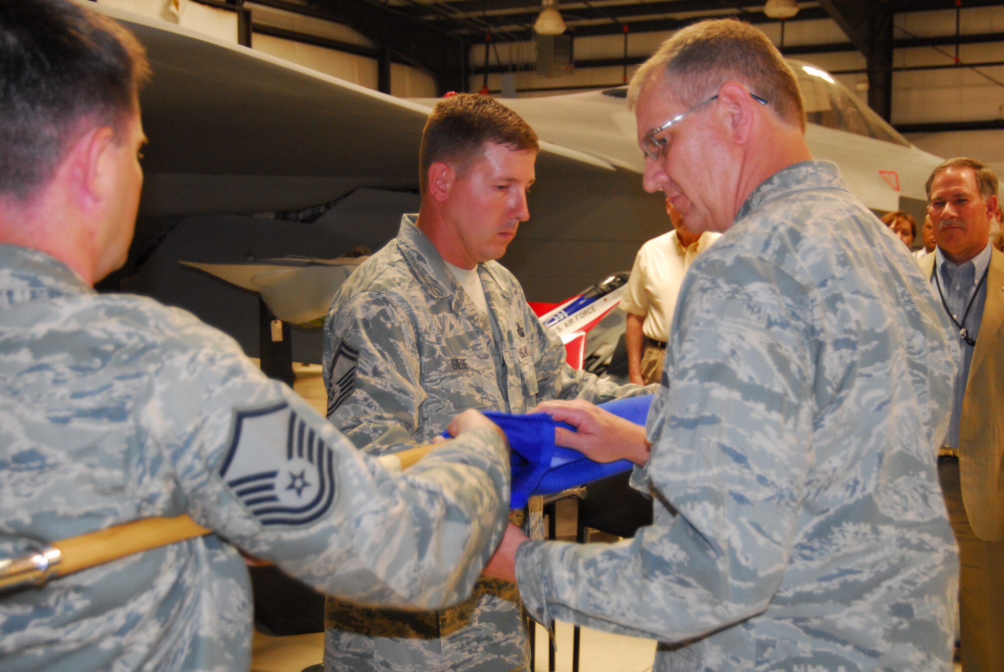 Team Edwards continued its command restructuring process today with the inactivation of the 95th Communications Group.  Col. Paul R. Hardy, 95th Communications Group commander, inactivated the heretofore individual command, and relinquished command to Col. Darrell L. Riggs, 95th Mission Support Group commander.  The 95th Communications Group became the 95th Communications Squadron under the provisions of Air Force Instruction 51604 and Special Organization Number GA-4.  The squadron will be headed by Mr. Rob Beutel, 95th Communications Squadron director.  (Air Force photograph by Stephen K. Robinson)
