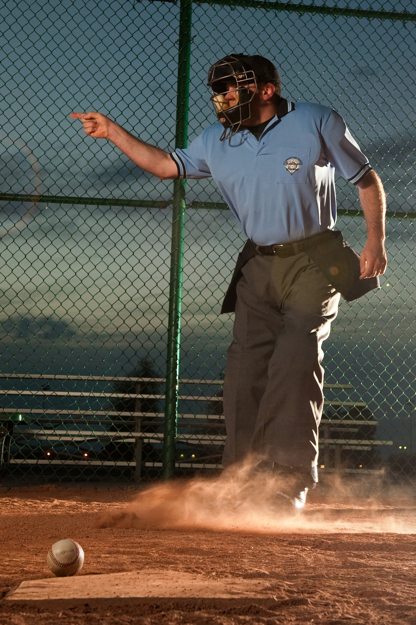 BUCKLEY AIR FORCE BASE, Colo. --  Staff Sgt. Larry Bouchard, Air Force Intelligence, Surveillance, and Reconnaissance Agency Detachment 45 Satellite Operations non-commissioned officer-in-charge, demonstrates how to signal a strike May 9. "A friend of mine was an umpire and knew I liked baseball," says Bouchard. "I tried it out and liked it so much that I continued with it." (U.S. Air Force photo by Staff Sgt. Kathrine McDowell)
