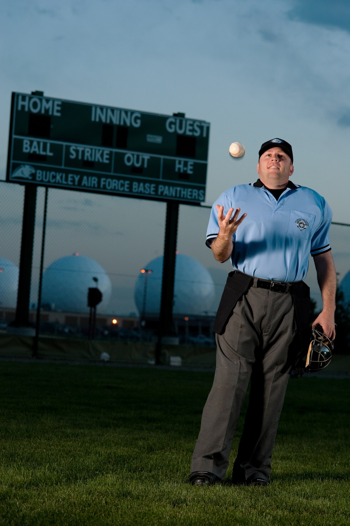 BUCKLEY AIR FORCE BASE, Colo. --  "A friend of mine was an umpire and knew I liked baseball," says Staff Sgt. Larry Bouchard, Air Force Intelligence, Surveillance, and Reconnaissance Agency Detachment 45 Satellite Operations non-commissioned officer-in-charge. "I tried it out and liked it so much that I continued with it." Sergeant Bouchard poses for a photo at the base softball field May 9. (U.S. Air Force photo by Staff Sgt. Kathrine McDowell)