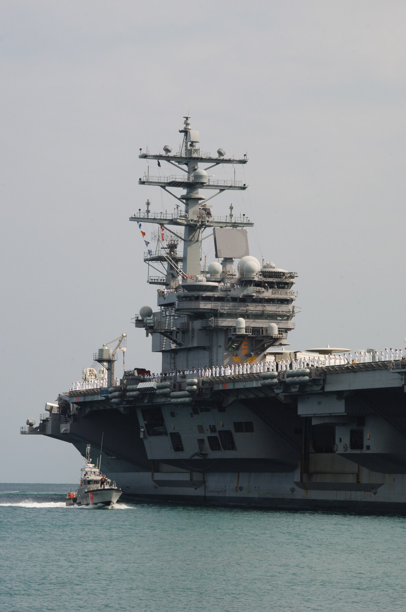 The USS Reagan, a U.S. Navy aircraft carrier, approaches Joint Base Pearl Harbor Hickam, Hi. June 29 to participate in the 2010 "Rim of the Pacific" exercise. RIMPAC is the world's largest maritime exercise held biennially in June and July in Honolulu, Hawaii under the leadership of United States Pacific Command. (U.S. Air Force photo by Staff Sgt. Nathan Allen)