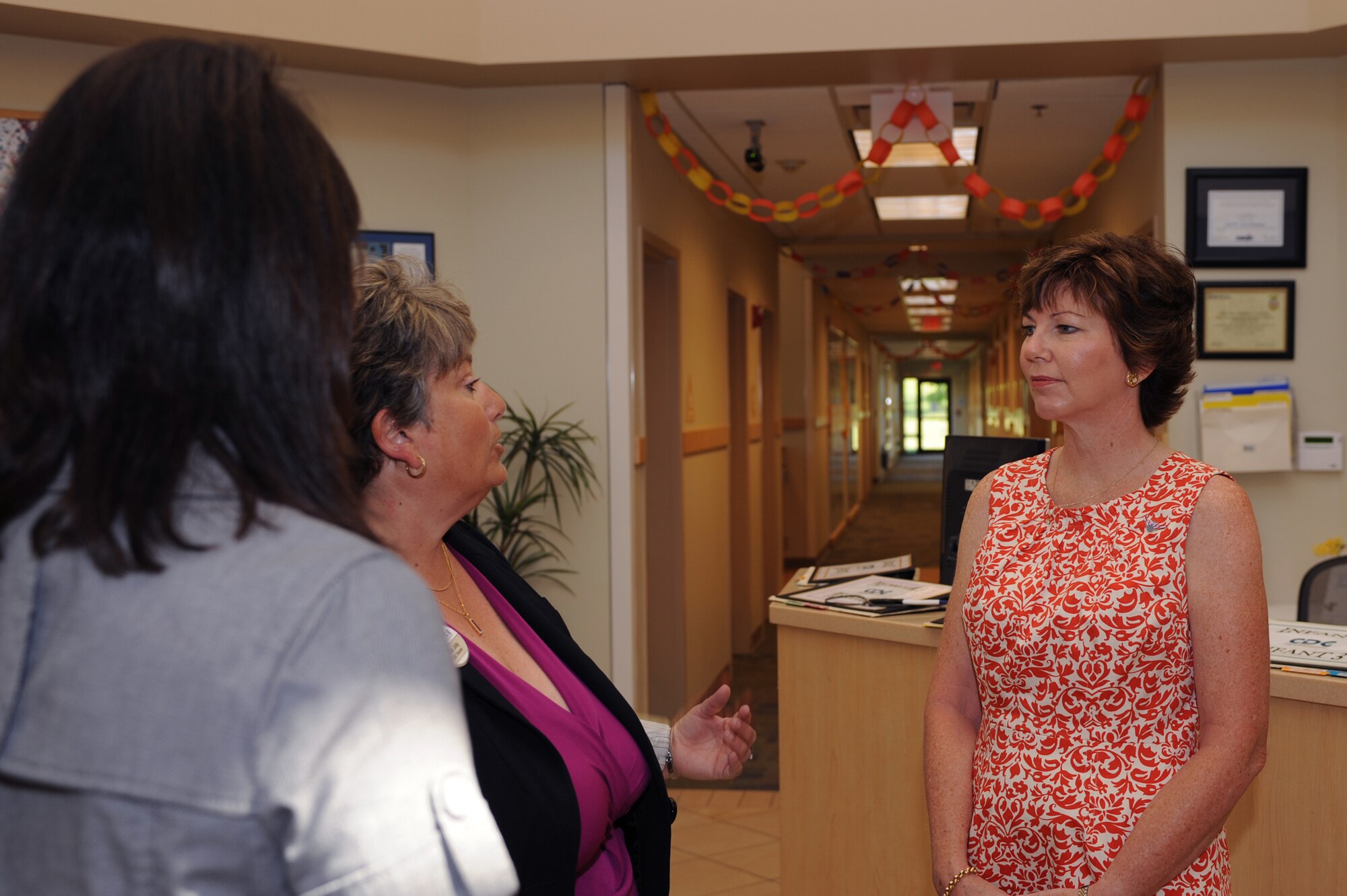 WHITEMAN AIR FORCE BASE, Mo., -- Mrs. Julie Jolly, Director of the Child Development Center, gives  Mrs. Melissa Carpenter, wife of Maj. Gen. Floyd Carpenter, Eighth Air Force commander, a tour of the CDC during her visit here on Tuesday.
(U.S. Air Force photo/Staff Sgt. Jason Huddleston)

