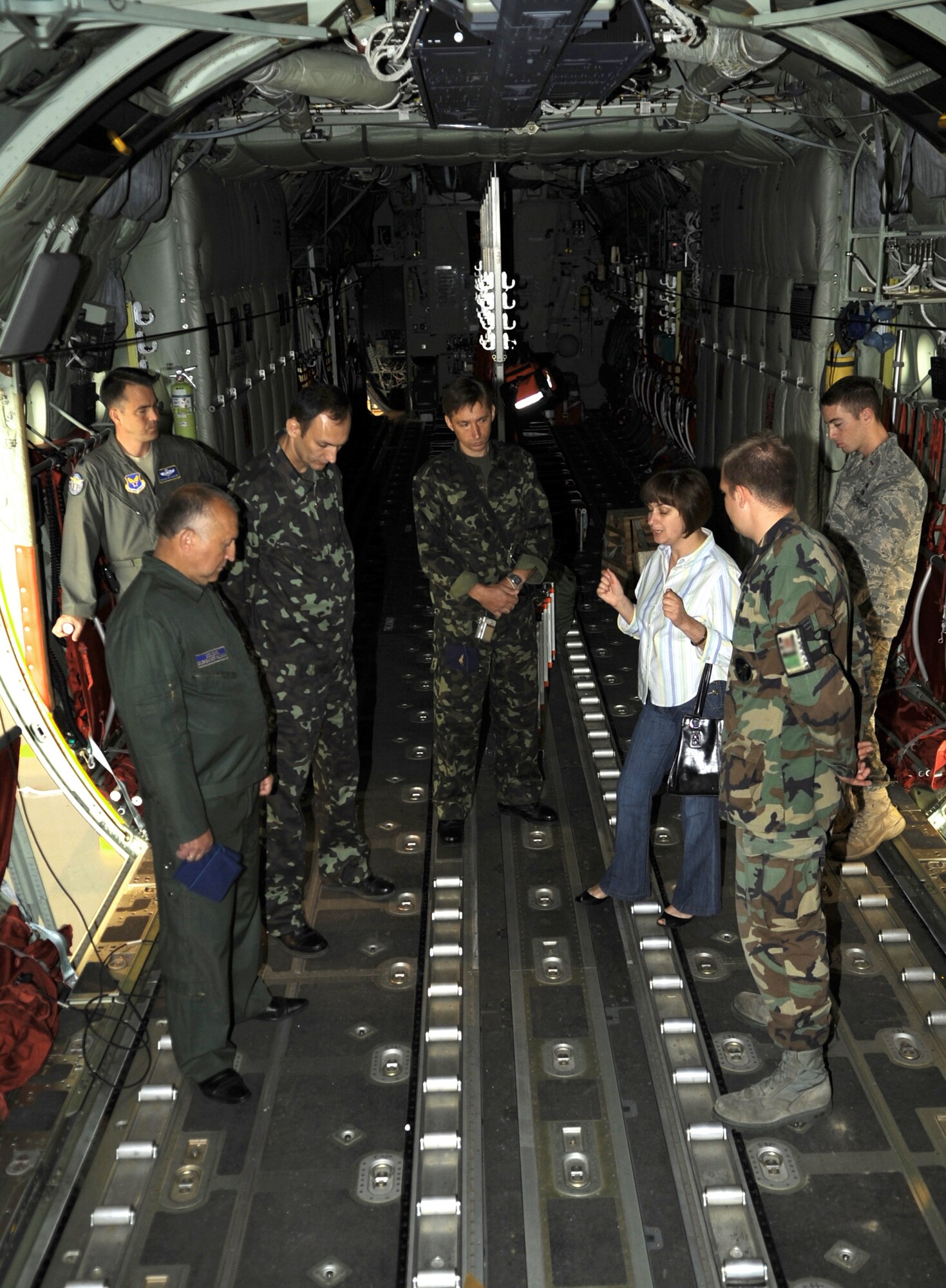 Senior Airman Joshua Sauer gives a tour of a C-130J Super Hercules to Ukrainian air force members June 24, 2010, during a visit to Ramstein Air Base, Germany. The goal of the Ukrainian visit was to help advance military interoperability and build international partnerships. Airman Sauer is the 86th Maintenance Squadron C-130J crew chief. (U.S. Air Force photo/Senior Airman Caleb Pierce)