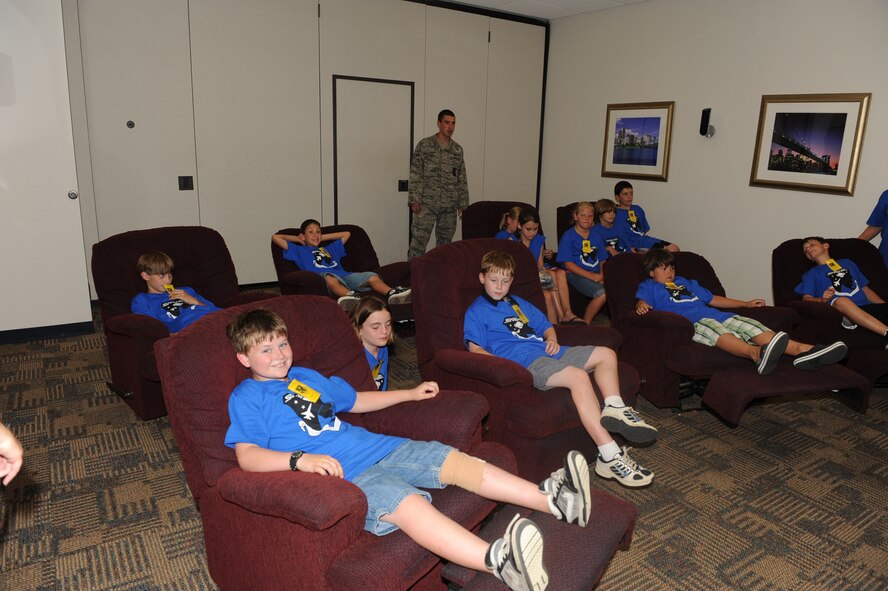 SEYMOUR JOHNSON AIR FORCE BASE, N.C. -- Participants in the Science and Technology Academies Reinforcing Basic Aviation and Space Exploration program take a break in the movie room during a tour of the fire station here June 21, 2010. The students spent the week learning compass reading, weather prediction, tools and witnessing the laws of motion in action. (U.S. Air Force photo/Senior Airman Gino Reyes)