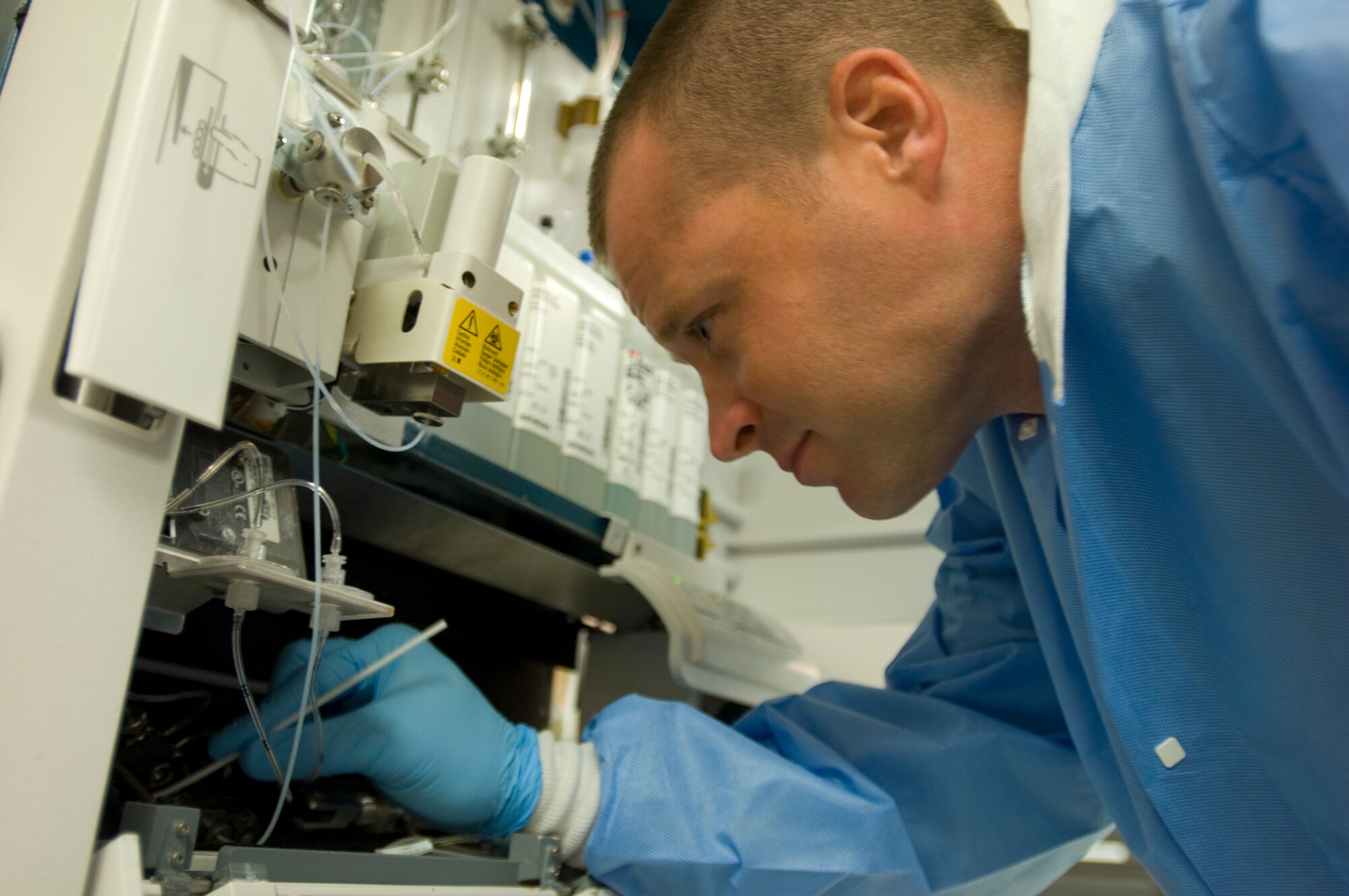 Staff Sgt. Daniel Mills, 22nd Medical Support Squadron medical laboratory technician, performs maintenance on a hematology system June 28, 2010, McConnell Air Force Base, Kan. The hematology system is one of five instruments that Sergeant Mills maintains and operates. (U.S. Air Force photo/Airman Armando A. Schwier-Morales)