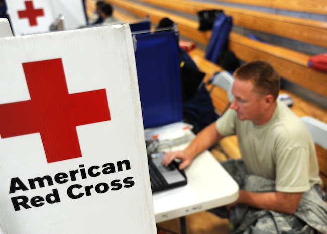 U.S. Air Force Tech. Sgt. Lester Crim completes the self-screening questionnaire before volunteering for the ALYX donation at the Red Cross mobile blood drive at the Sports and Fitness Center June 23, 2010, at Joint Base Charleston, S.C. The questionnaire is designed to eliminate donors that are not qualified to safely donate their blood. Some questions are similar to "Have you lived out of the United States in the past 3 years?" Sergeant Crim is a jet engine mechanic with the 315th Maintenance Squadron. (U.S. Air Force photo/Senior Airman Timothy Taylor)