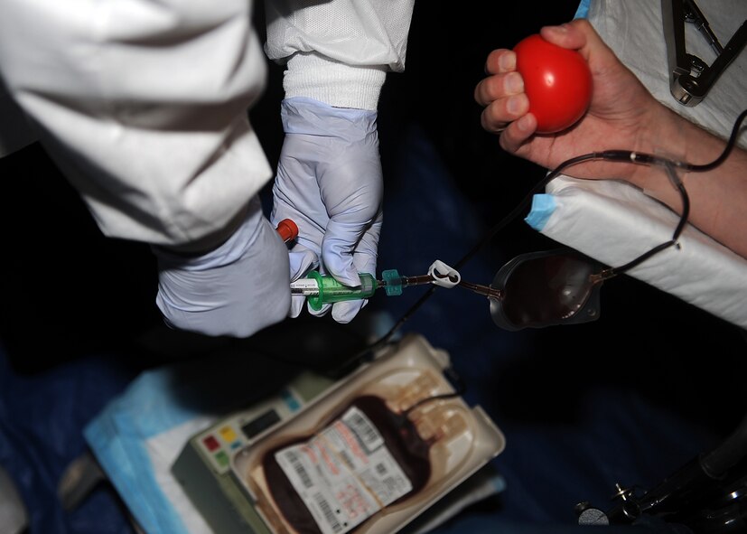 SEYMOUR JOHNSON AIR FORCE BASE, N.C. -- A volunteer donates a pint of blood during an Armed Services blood drive at Heritage Hall Community Center June 28, 2010. Blood or plasma replenishes within 24 hours after a donation; however red blood cells take four to eight weeks to completely restore. (U.S. Air Force photo/Senior Airman Ciara Wymbs) 
