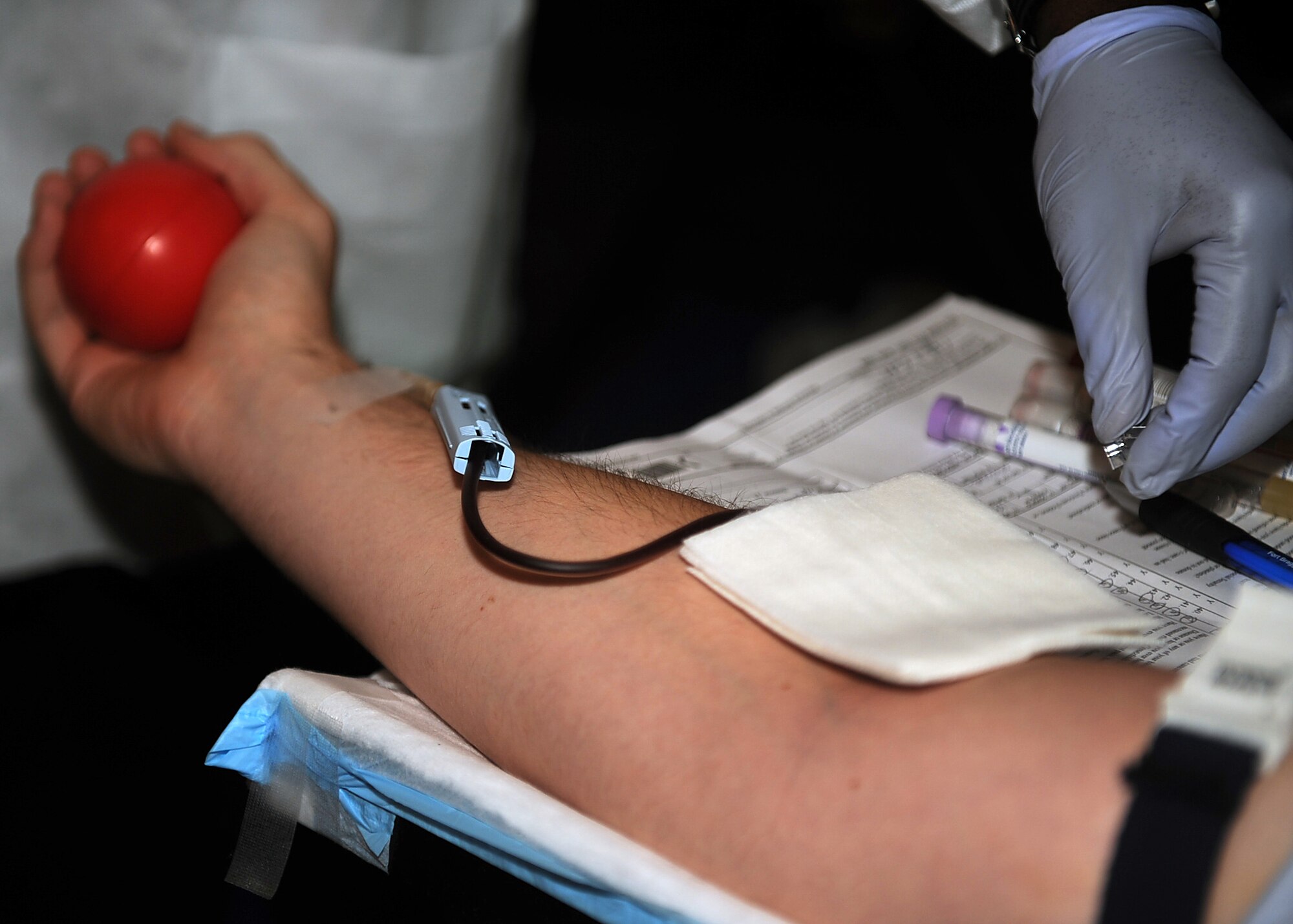 SEYMOUR JOHNSON AIR FORCE BASE, N.C. -- Airman 1st Class Cliffard Redd gives blood during an Armed Services blood drive at Heritage Hall Community Center June 28, 2010. The ASBP provides quality blood to servicemembers and their families in both peace and war time. Airman Redd, 4th Operations Support Squadron air traffic controller, hails from Athens, Ga. (U.S. Air Force photo/Senior Airman Ciara Wymbs) 
