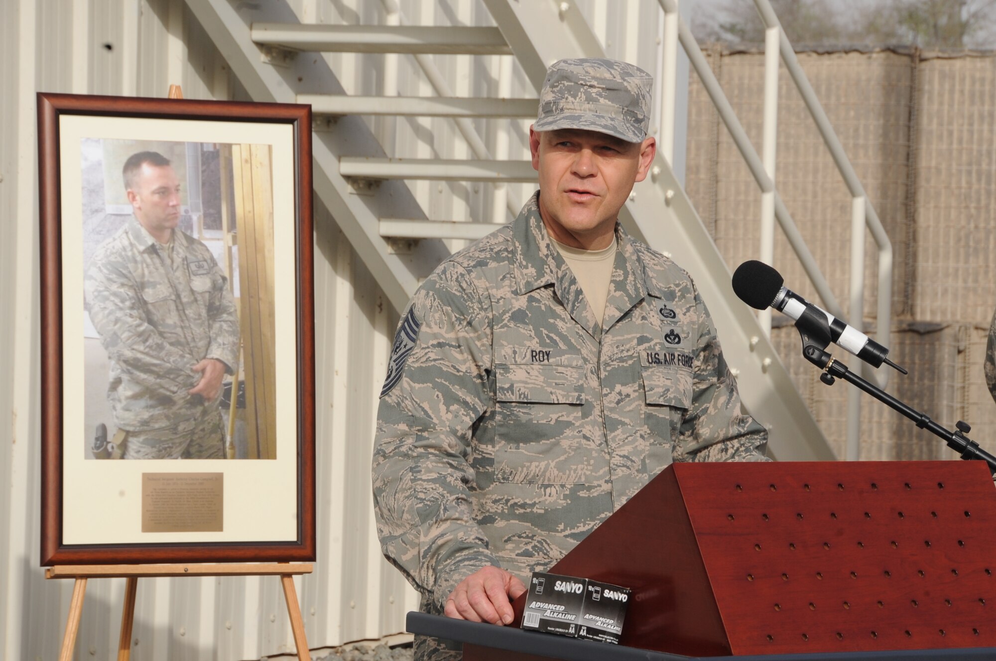 Chief Master Sgt. of the Air Force James A. Roy speaks at a building dedication ceremony June 27 at an undisclosed base in Southwest Asia. The building was named in honor of Tech. Sgt. Anthony C. Campbell, Jr., a EOD technician who was killed in action by an improvised explosive device while forward deployed to Afghanistan. (U.S. Air Force photo/ Tech. Sgt. April Wickes)