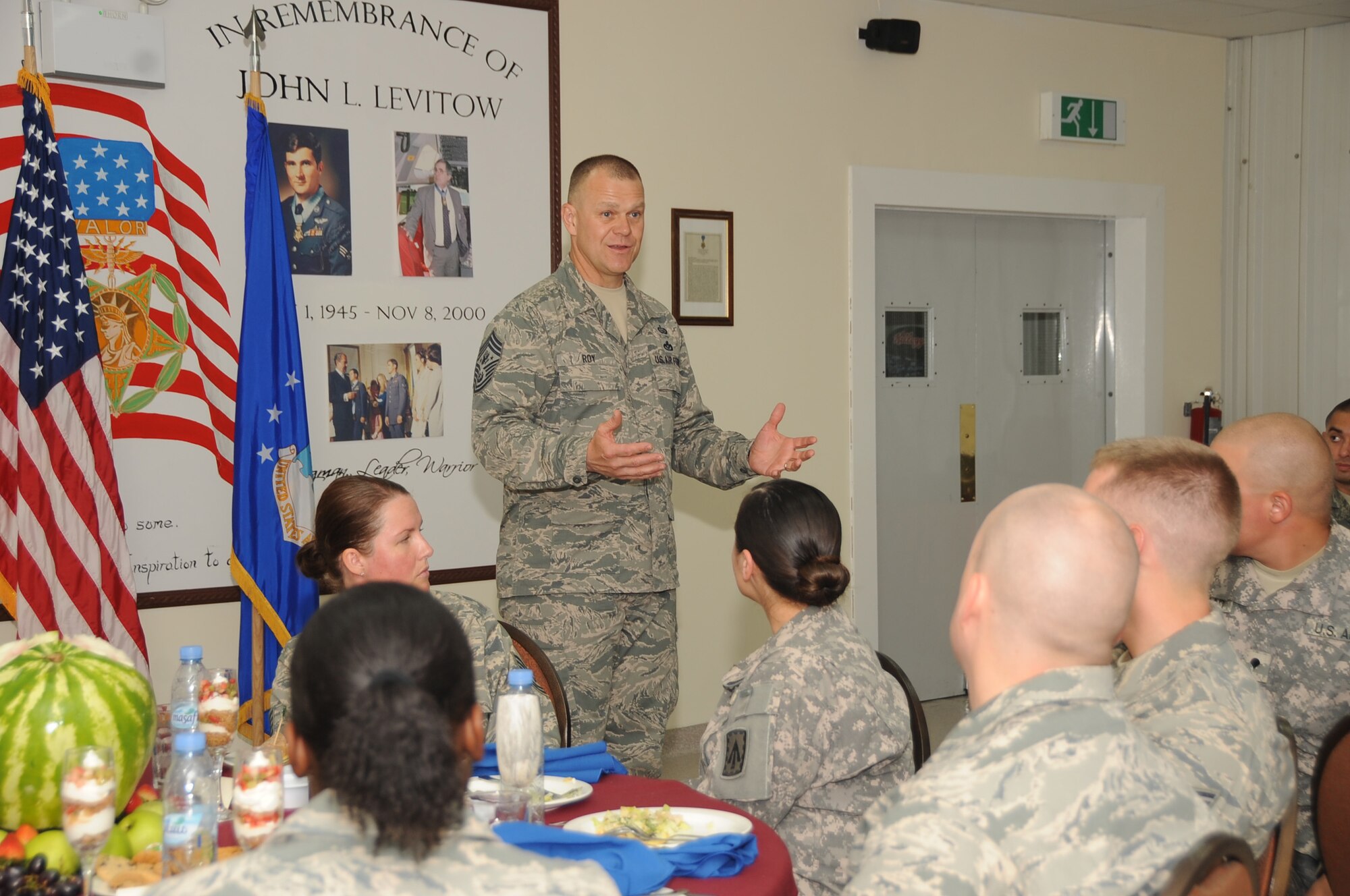 Chief Master Sgt. of the Air Force James A. Roy talks to a group of Airmen during breakfast June 27 at an undisclosed base in Southwest Asia. Chief Roy was here as part of as part of his tour of bases in the U.S. Central Command area of responsibility. (U.S. Air Force photo/ Tech. Sgt. April Wickes)

