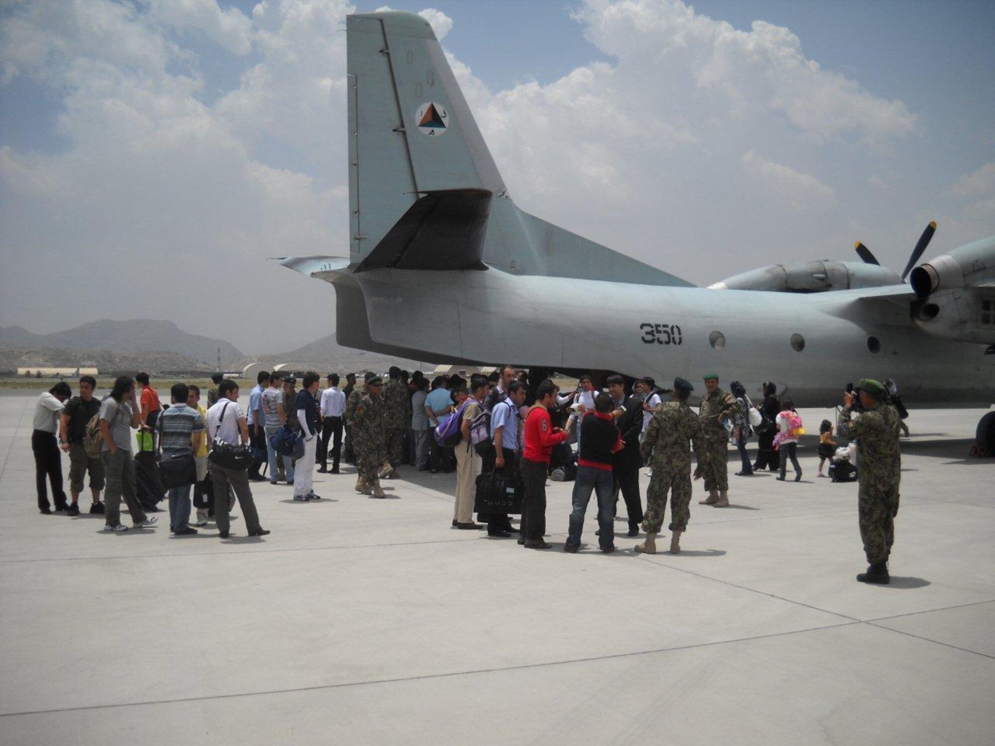 KABUL, Afghanistan - A total of 51 Afghan men, women, and children were evacuated from the neighboring country of Kyrgyzstan by the Afghan National Army Air Force on June 23rd, 2010. (U.S. Military photo/Released).

