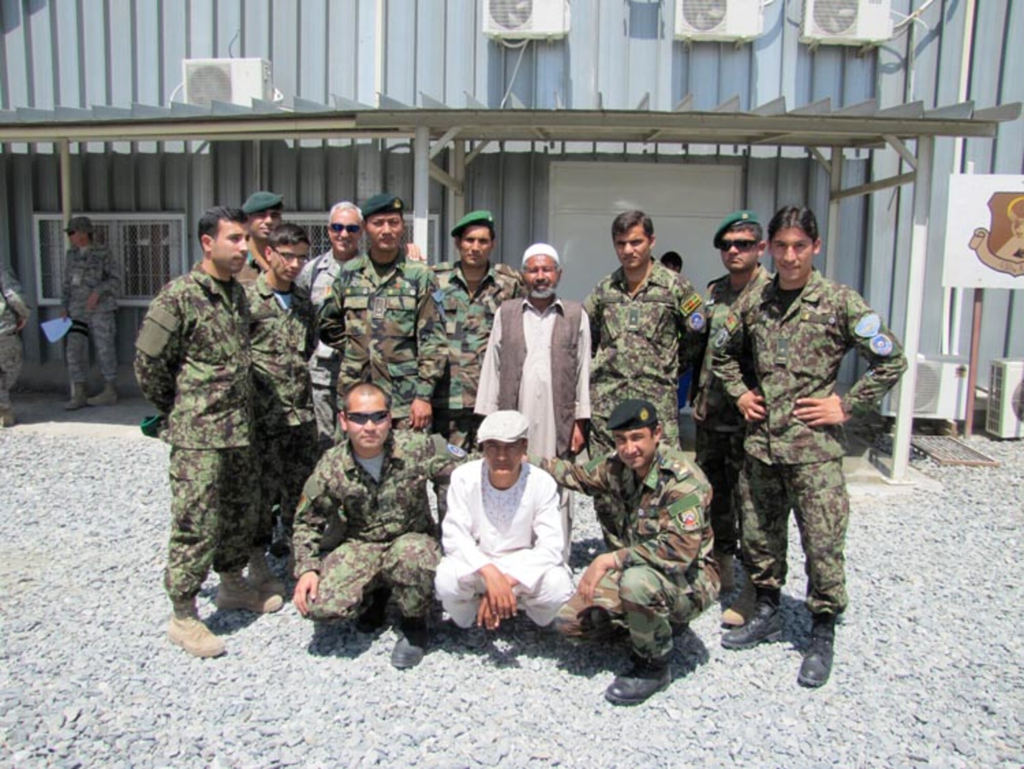 Afghan National Army Air Force 2nd Lieutenant Said Muzafarshah Anwari signs his service commitment to attend Undergraduate Pilot Training in the United States on Jun. 20, 2010 at the Afghan National Army Air Force base in Kabul, Afghanistan (U.S. Navy photo by Mass Communications Specialist First Class Elizabeth Burke/RELEASED).
