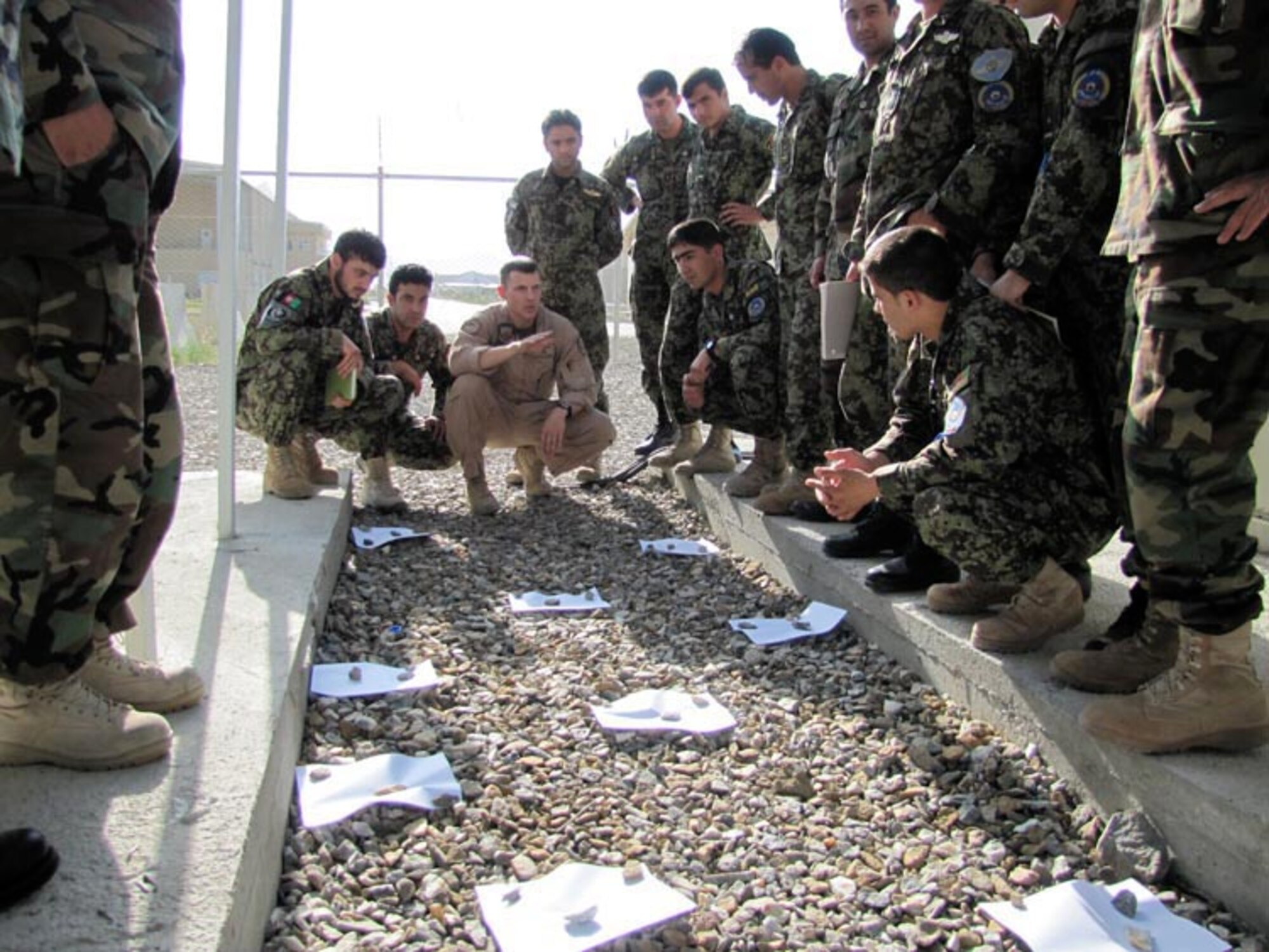 Afghan National Army Air Force Thunder Lab officers practice communication exercises on Jun. 19, 2010 at the Afghan National Army Air Force base in Kabul, Afghanistan (U.S. Navy photo by Mass Communications Specialist First Class Elizabeth Burke/RELEASED).