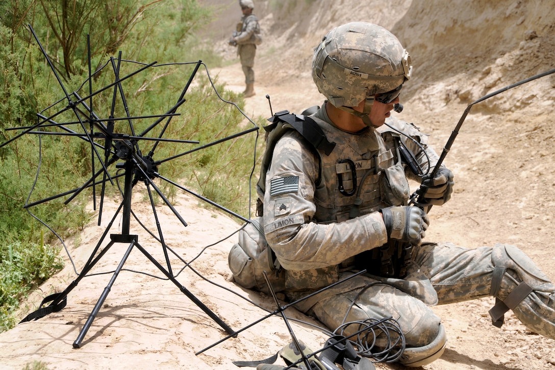 U.S. Army Sgt. Anthony Limon sets up the tactical satellite antenna while on patrol in Zabul province, Afghanistan, June 25, 2010. Limon is assigned to Company D, 1st Battalion 4th Infantry Regiment.