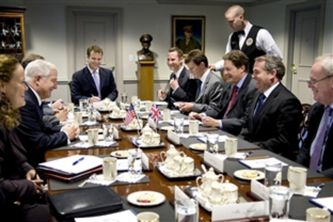 U.S. Defense Secretary Robert M. Gates, center left, meets with United Kingdom Defense Secretary Liam Fox, second from right, at the Pentagon, June 29, 2010.