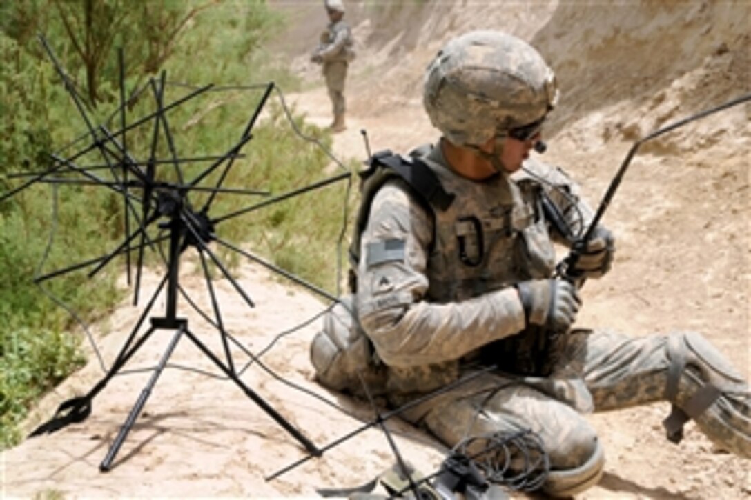 U.S. Army Sgt. Anthony Limon sets up a tactical satellite antenna while on patrol in Zabul province, Afghanistan, June 25, 2010. Limon is assigned to Company D, 1st Battalion 4th Infantry Regiment.
