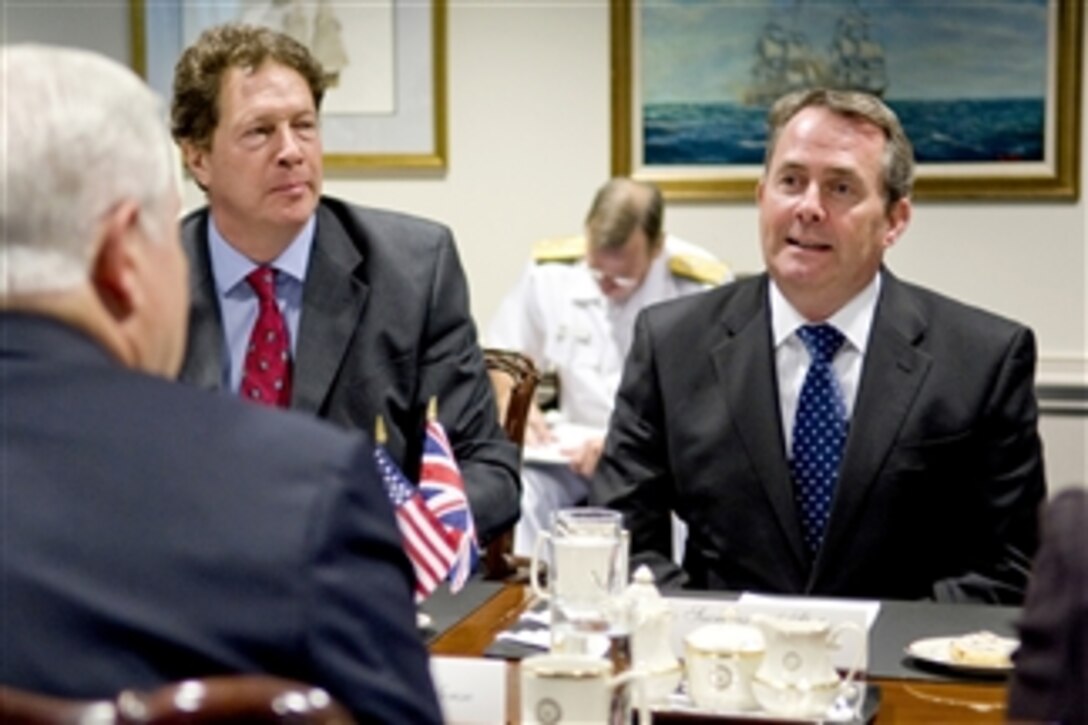 Secretary of Defense Robert M. Gates (left) meets with British Secretary of State for Defense Liam Fox (right) in the Pentagon on June 29, 2010.  