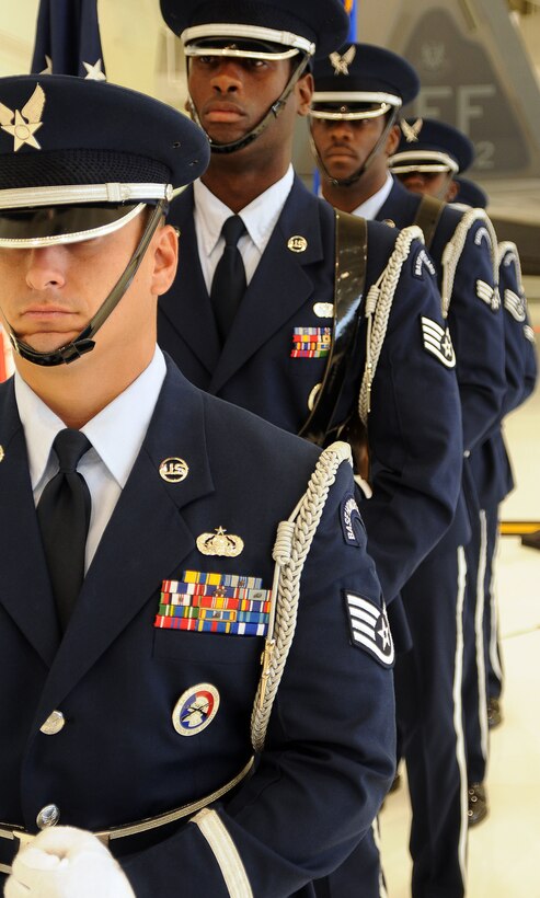 ANDERSEN AIR FORCE BASE, Guam - Members of the Andersen Honor Guard prepare to present the colors during the 36th Wing Change of Command Ceremony here June 25. During the ceremony, Brig. Gen. (select) John Doucette assumed command of the 36th Wing from outgoing commander Brig. Gen. Philip Ruhlman. ( U.S. Air Force photo by Airman Julian North)