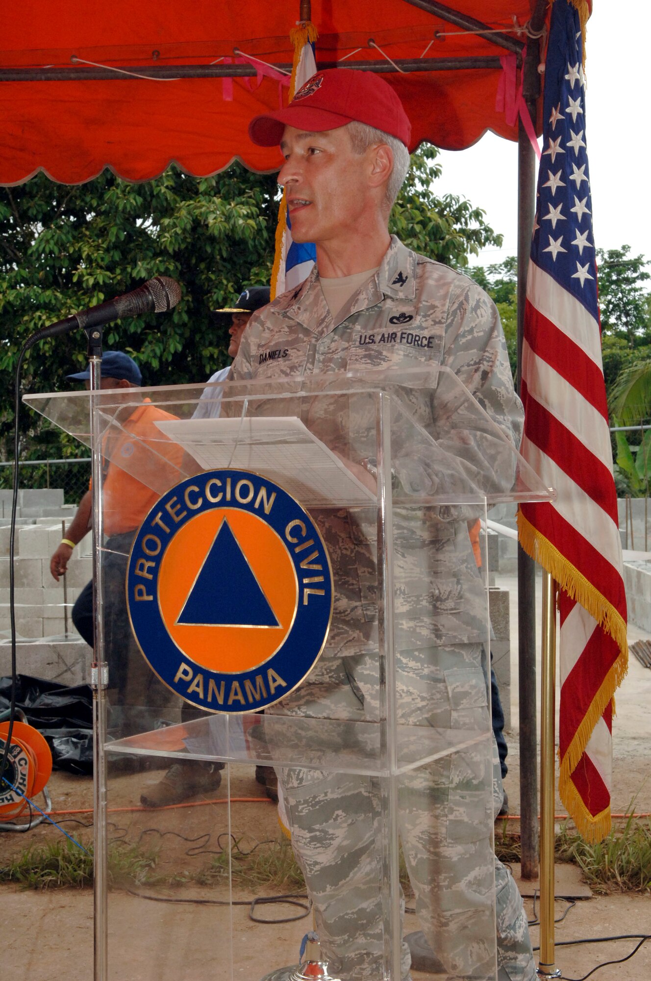 Col. Darren Daniels, the Task Force New Horizons commander, addresses the audience during the New Horizons Panama 2010 opening ceremony June 29 at Santa Librada Elementary School. (U.S. Air Force photo/Tech. Sgt Eric Petosky)