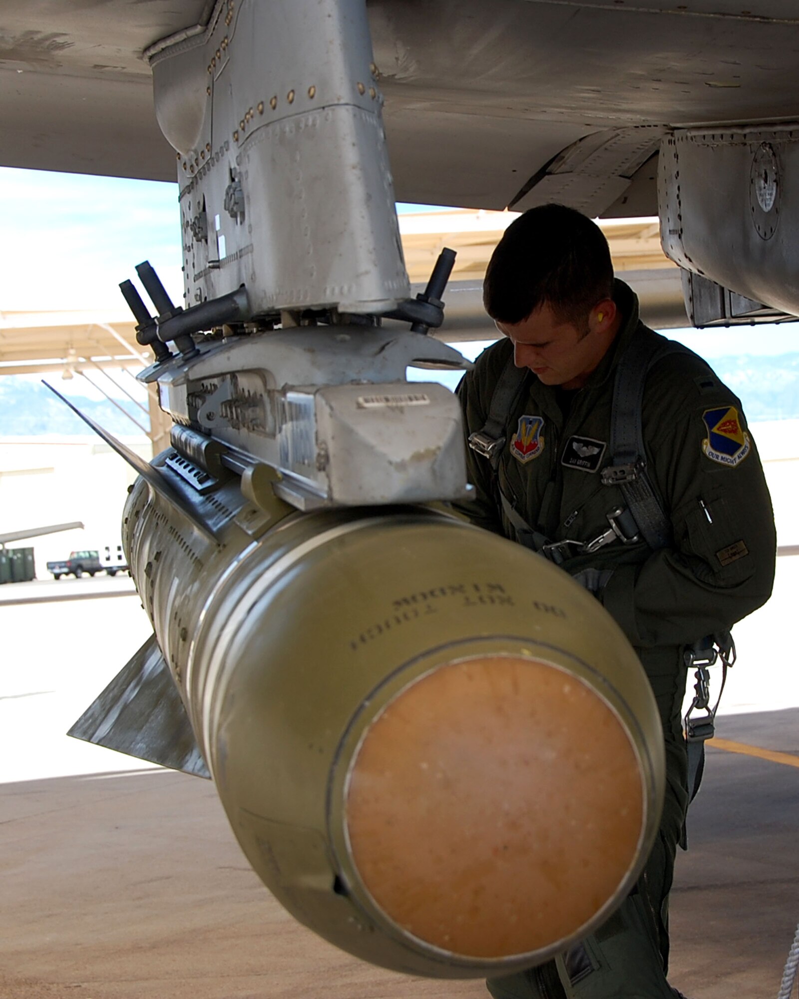 1st Lt. Dan Griffin, a pilot from the 358th Fighter Squadron, records the maverick serial number as part of his pre-flight weapons inspection here June 8. Lieutenant Griffin is a student in the A-10C Pilot Initial Qualification course and upon completion of this course he will be a fully qualified A-10C pilot. (U.S. Air Force photo/Capt. Stacie N. Shafran)