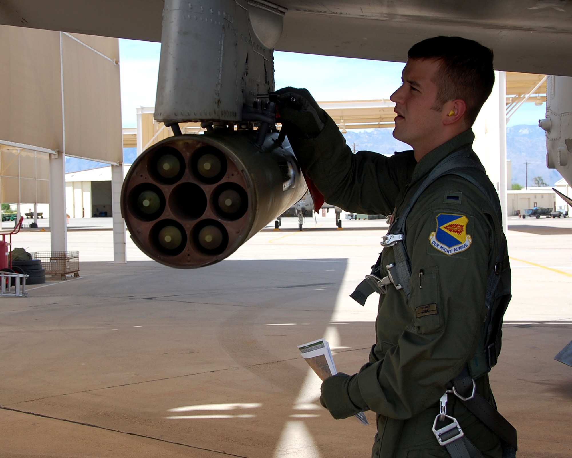 1st Lt. Dan Griffin, a pilot from the 358th Fighter Squadron, checks the safety pin and the ripple settings for a pod of white phosphorus “Willie Pete” rockets as part of his pre-flight weapons inspection, here June 8. Lieutenant Griffin is a student in the A-10C Pilot Initial Qualification course and upon completion of this course he will be a fully qualified A-10C pilot. To learn more about his journey through the course, check out “Behind the Scenes: The Making of an A-10C Pilot” at www.dm.af.mil. (U.S. Air Force photo/Capt. Stacie N. Shafran)