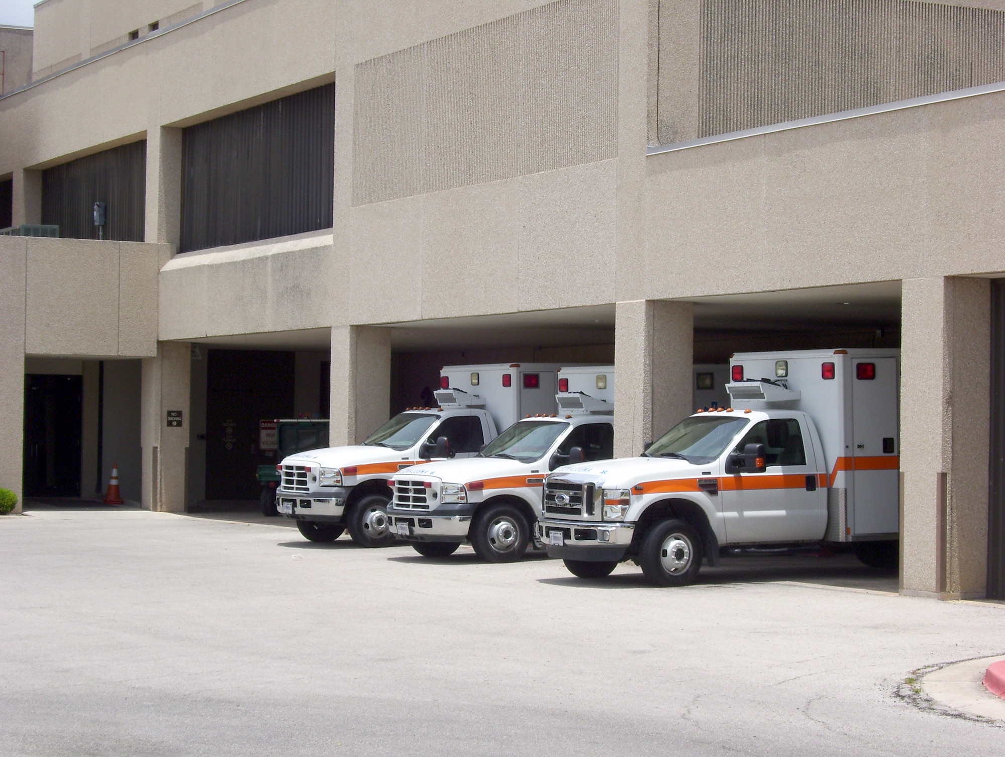 Ambulances are parked outside the emergency room at Wilford Hall Medical Center, San Antonio. Beginning July 1, 2010, Wilford Hall Medical Center will discontinue trauma services. All severely injured trauma patients from San Antonio, Bexar County and surrounding counties, and South Texas, will go to nearby Brooke Army Medical Center or University Hospital in San Antonio, the other two leading trauma centers serving the region. (Courtesy photo/Linda Frost)