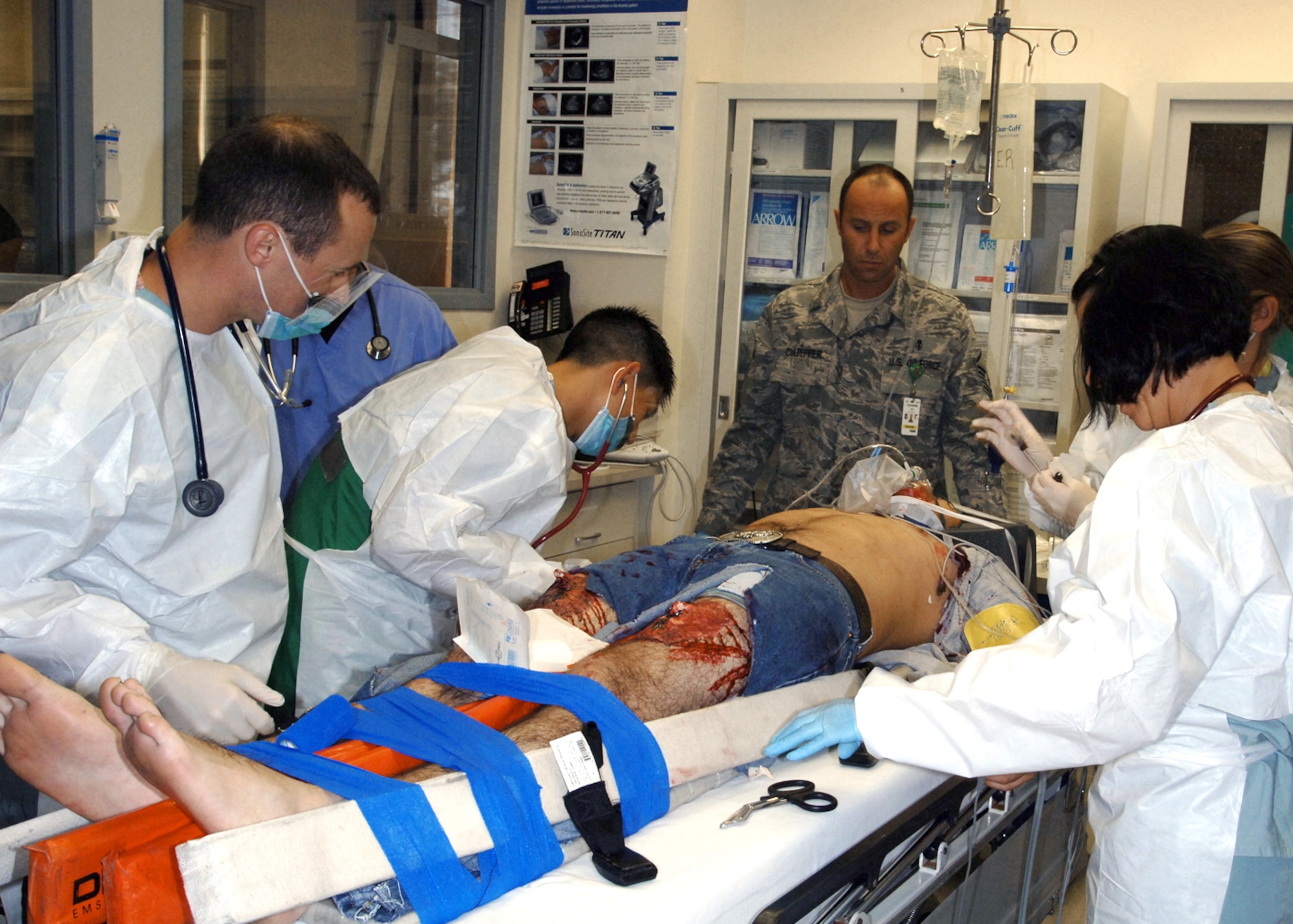 A 59th Medical Wing Trauma Team performs emergency resuscitation procedures during a mock exercise.  As of Jul 1, Wilford Hall Medical Center will no longer care for trauma patients. The hospital's trauma staff will move its Air Force trauma mission to Ft. Sam to create the San Antonio Military Medical Center by September, 2011, in compliance with the 2005 BRAC law. The WHMC emergency department remains open for non-trauma care. (U.S. Air Force photo/Tech. Sgt. Thomas Coney)

