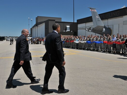 President Barack Obama and Wisconsin Gov. Jim Doyle head for members of the 128th Air Refueling Wing, Wisconsin Air National Guard waiting to meet the President June 30, 2010.  The President landed at the 128th in route  to a town hall meeting in Racine Wisconsin. (U.S. Air Force Photo by SMSgt Jeff Rohloff/released)