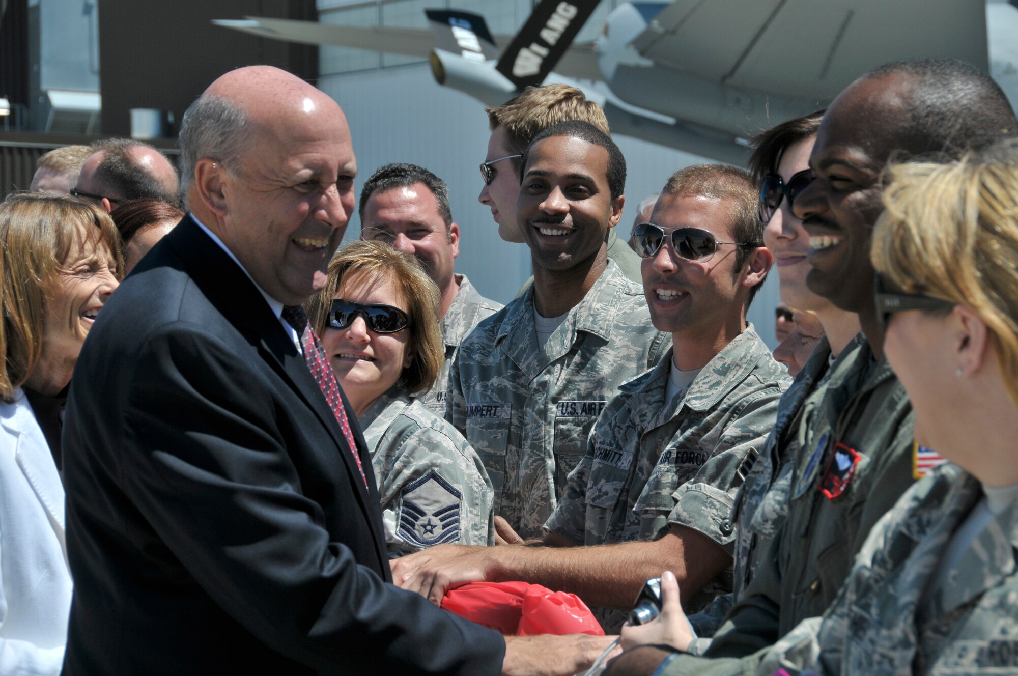 Wisconsin Gov. Jim and First Lady Jessica Doyle great members of the 128th Air Refueling Wing, Milwaukee  June 30,2010. The Governor and First Lady were in Milwaukee to greet President Barack Obama and to accompany him to a town hall meeting in Racine Wisconsin. (U.S. Air Force Photo by SMSgt Jeff Rohloff)