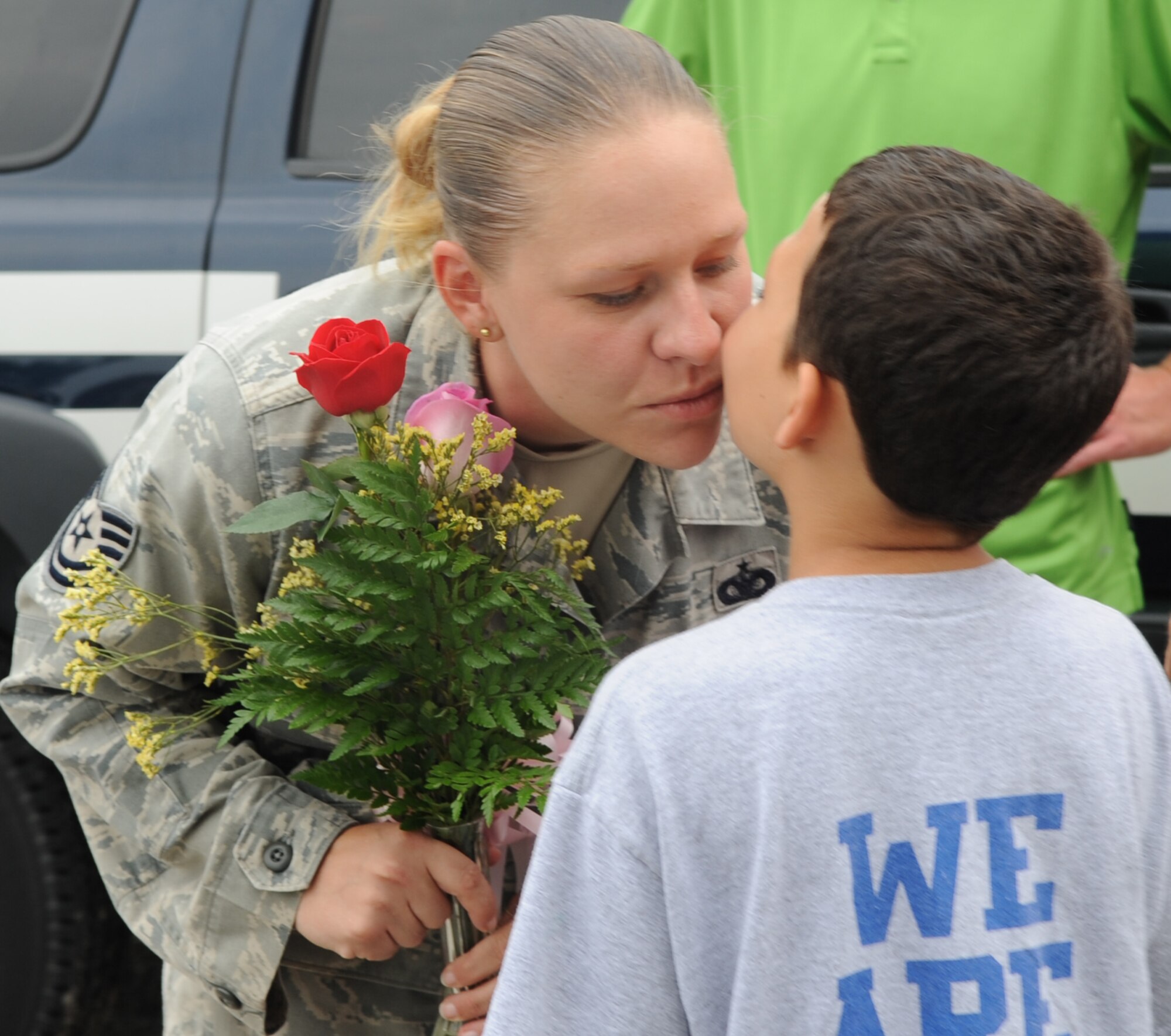 SEYMOUR JOHNSONAIR FORCE BASE, N.C. – Tech. Sgt. Candice Morrison receives a kiss from her son, Jonathan, after returning home from a six-month deployment to Joint Base Balad, Iraq, June 30, 2010. While deployed in support of Operation Iraqi Freedom, Sergeant Morrison, 4th Security Forces Squadron squad leader, was part of a team that responded to more than 15 incidents at the perimeter fence and 28 indirect fire attacks. (U.S. Air Force photo/Tech. Sgt. Tammie Moore)