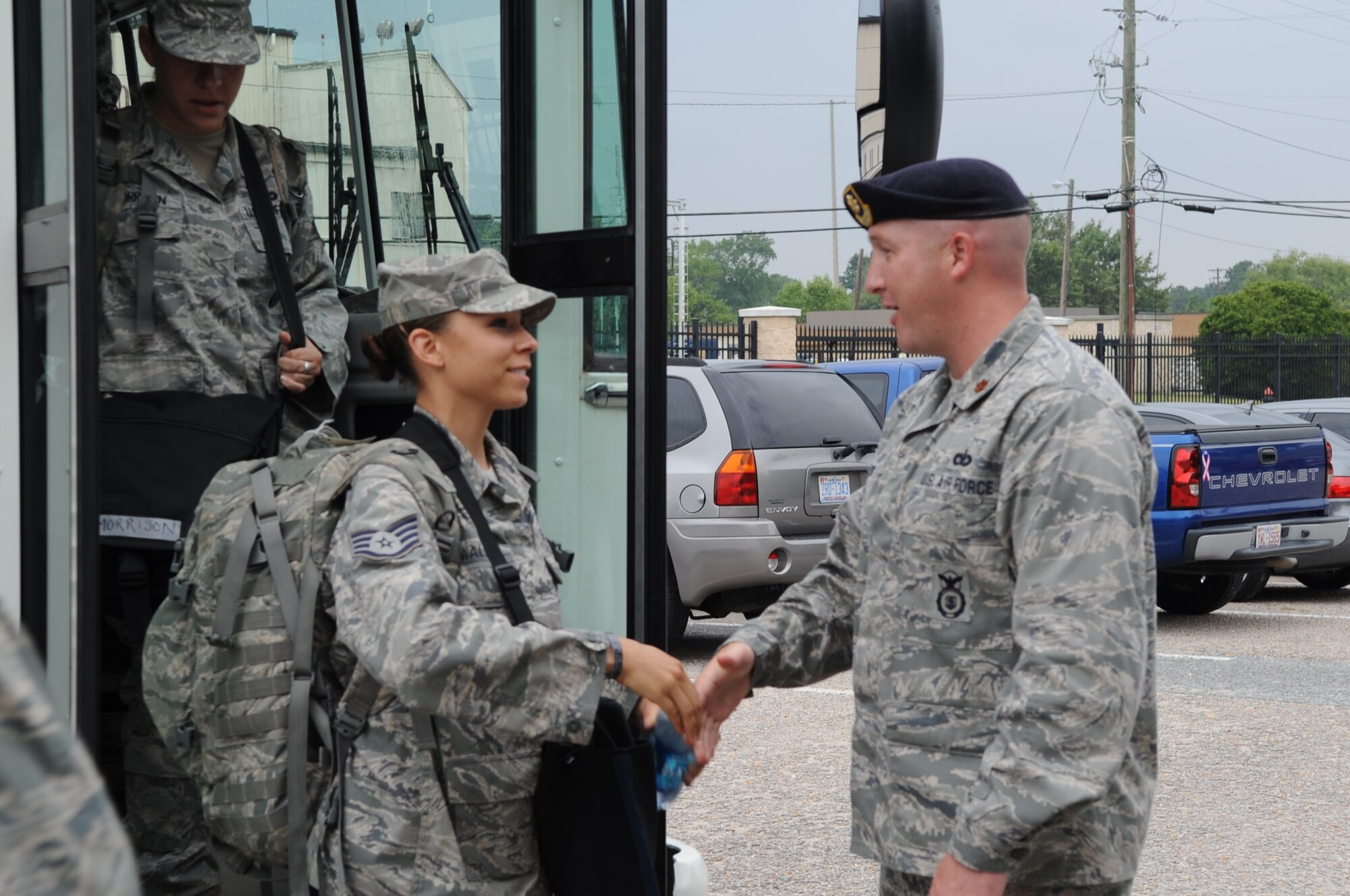 SEYMOUR JOHNSONAIR FORCE BASE, N.C. – Maj. Jim Alves welcomes Staff Sgt. Kimberly Walton home from a six-month deployment to Joint Base Balad, Iraq, June 30, 2010. While deployed, Sergeant Walton, 4th Security Forces Squadron patrolman, was part of a team that helped facilitate the transport of more than 1,000 insurgents. Major Alves is the 4th SFS commander. (U.S. Air Force photo/Tech. Sgt. Tammie Moore)