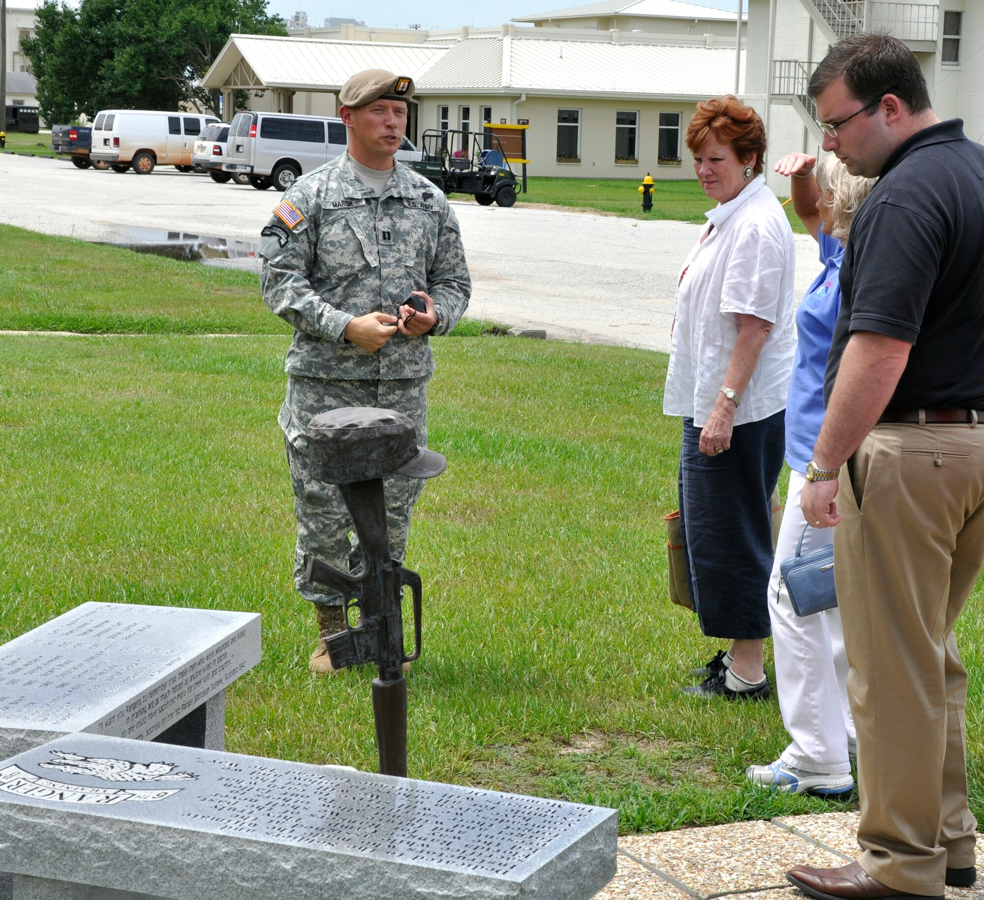 (Left) Army Capt. Adam Marsh, 6th Ranger Training Battalion public affairs officer, answers questions regarding the origin of the Ranger Training Battalion during the quarterly tour for Team Eglin Honorary Commanders June 29.   The Honorary Commanders got the chance to visit the 6th Ranger Training Battalion at Fort Rudder as part of the program's quarterly tour. The program was created to establish and maintain positive relations with civilian counterparts as well as civic and business leaders. It also allows the general public to experience the mission by spending time with their military counterpart to observe their duties and on-base operations. The experience the honorary commanders come away with was an inside-look at the role Eglin plays in supporting the Air Force mission and national defense. (U.S. Air Force photo/Errica Bennett.) 