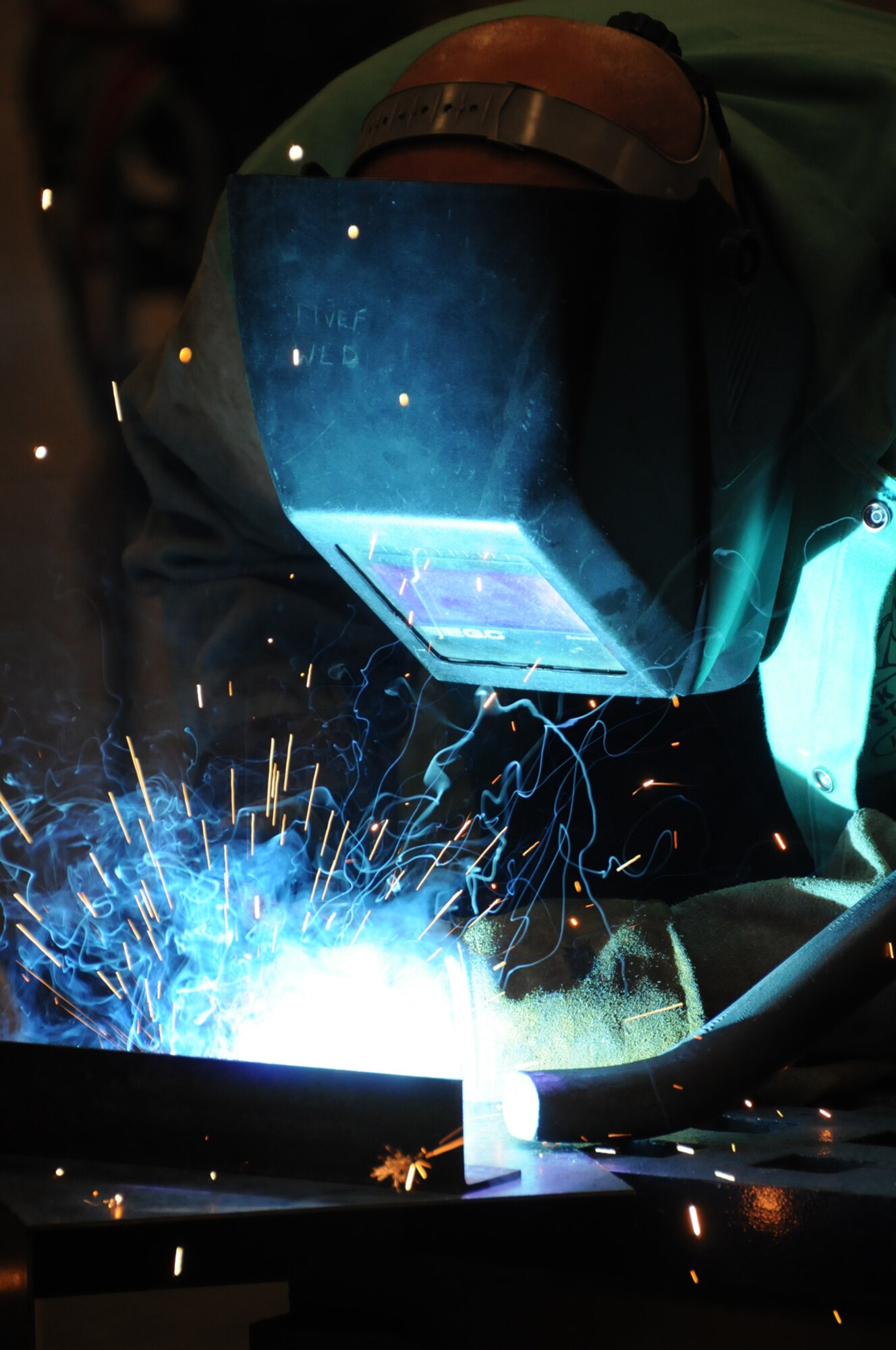 Welder Heath Harris is one of the craftsmen in the 81st TRSS trainer development flight.  (U.S. Air Force photo by Kemberly Groue)