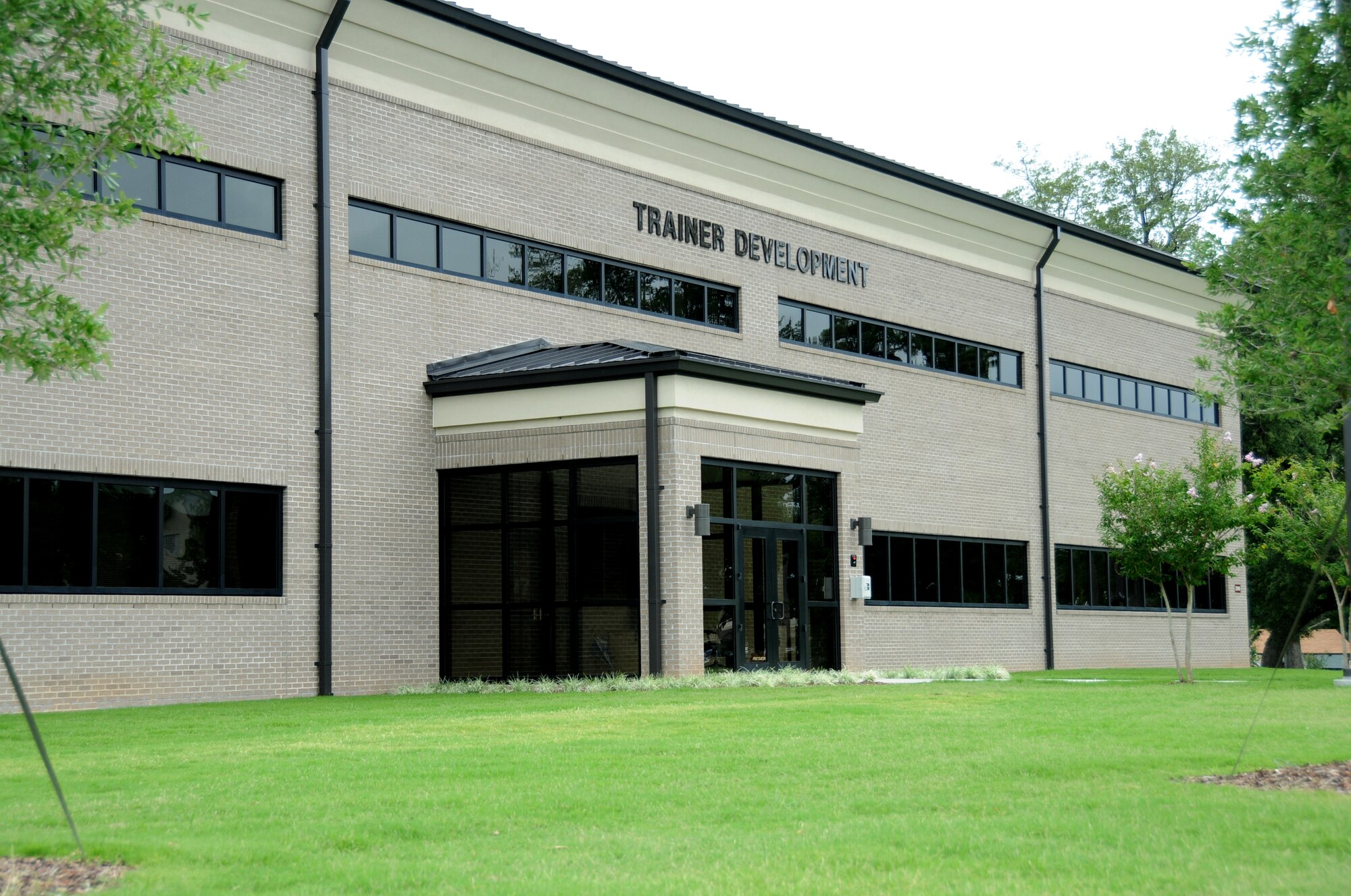 The 38,000 square foot trainer development facility is at the southwest corner of Larcher Boulevard and Chappie James Avenue.  (U.S. Air Force photo by Kemberly Groue)