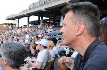 Col. Randy Ogden, 916th ARW commander, watches intently during the Charlotte Knights baseball game. (USAF photo by SSgt. Terrica Jones, 916ARW/PA)