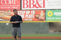 Col. Randy Ogden 916th ARW commander, prepares to throw out the first pitch at the Charlotte Knights game on June 26. (USAF photo by SSgt. Terrica Jones, 916ARW/PA)