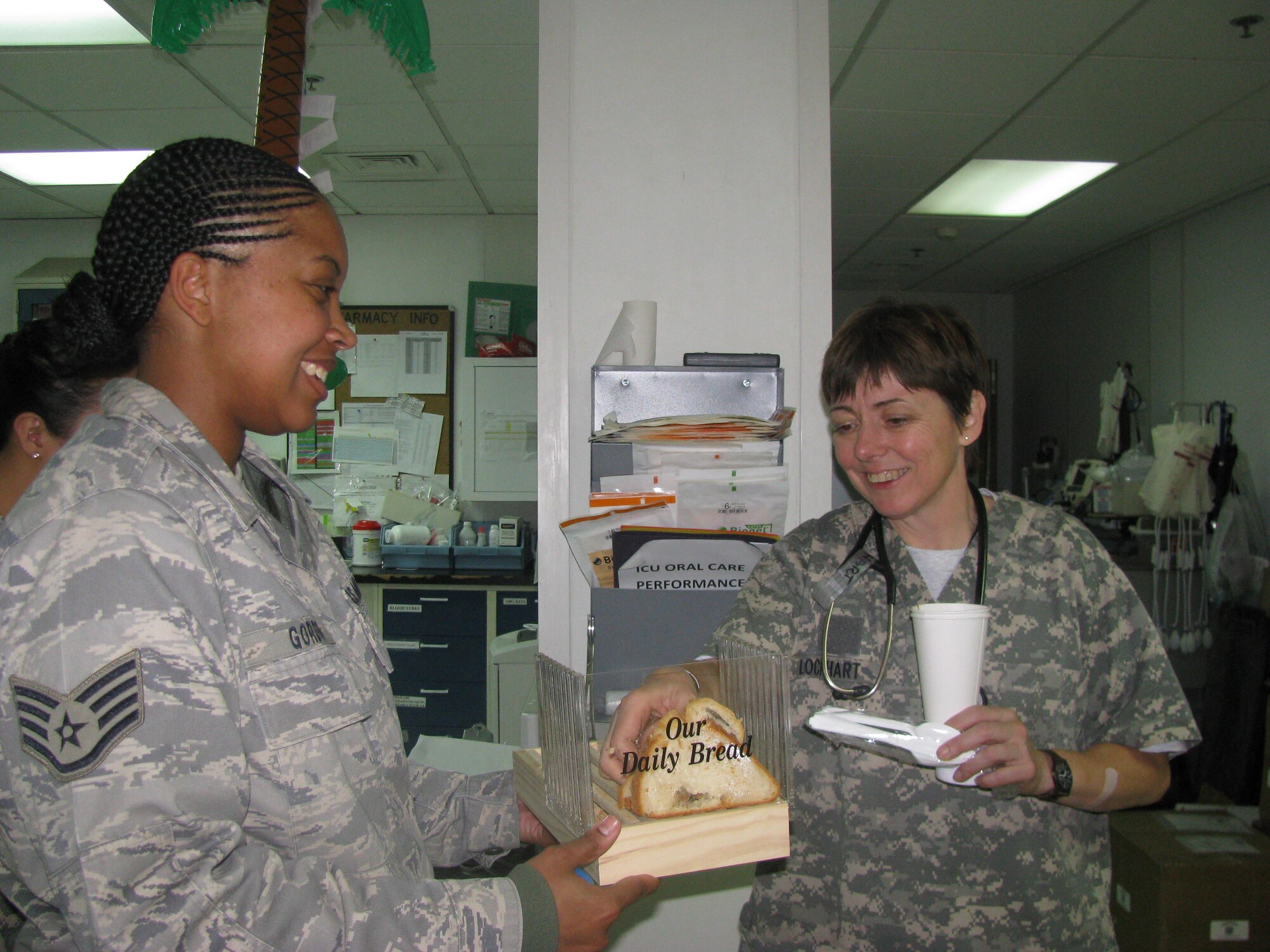 Staff Sgt. Tomeka Gordon, left, a chaplain’s assistant deployed from Keesler, has been recognized as the 455th Air Expeditionary Wing’s Warrior of the Week. As a religious support team member at the Craig Joint Theater Hospital at Bagram Air Base, Afghanistan, Sergeant Gordon supports the religious diversity of more than 300 hospital staff members and a monthly average of more than 600 patients. She’s supported needs outside of her career field including guarding inpatient enemy patients, aeromedical evacuation, patient care and trauma response.  (Air Force photo)