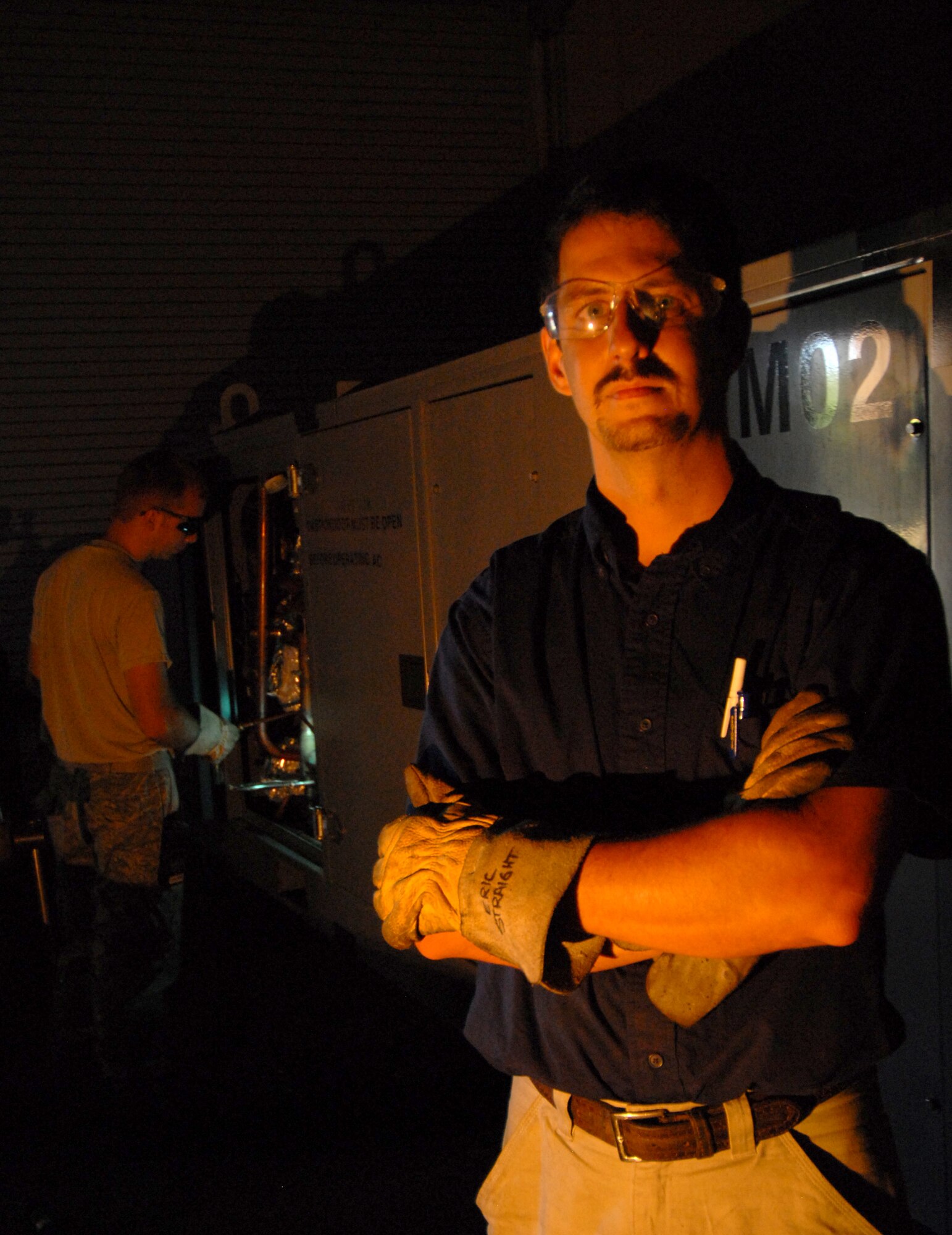 Eric Straight, 1st Special Operations Equipment Maintenance Squadron aircraft metals technology craftsman, poses at his work station at the 1st SOEMS at Hurlburt Field, Fla., June 24, 2010. Mr. Straight was named the 2010 Air Force Association Outstanding Air Force Wage Grade Civilian of the Year June 29, 2010. (DoD photo by U.S. Air Force Staff Sgt. Orly N. Tyrell/Released)
