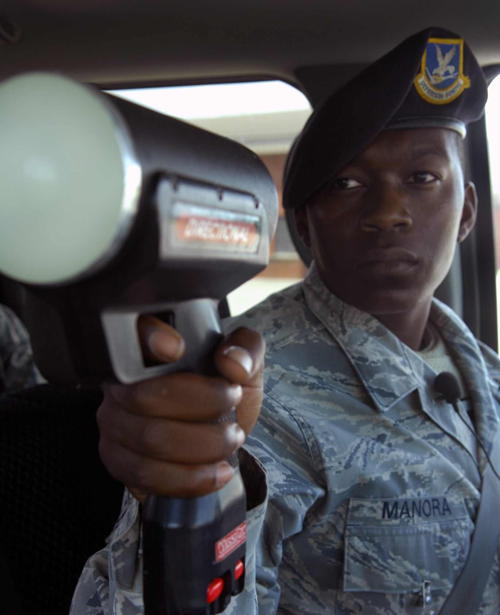 100629-F-6593P-003
Senior Airman Gregory Manora, 20th Security Forces Squadron Flight Armor, checks traffic to ensure safety on base June 29, 2010. Airman Manora is responsible for several different jobs in the squadron including the armory, patrolling, checking buildings and chow relief for other 20th SFS Airmen. (U.S. Air Force photo/Airman 1st Class Daniel R. Phelps)