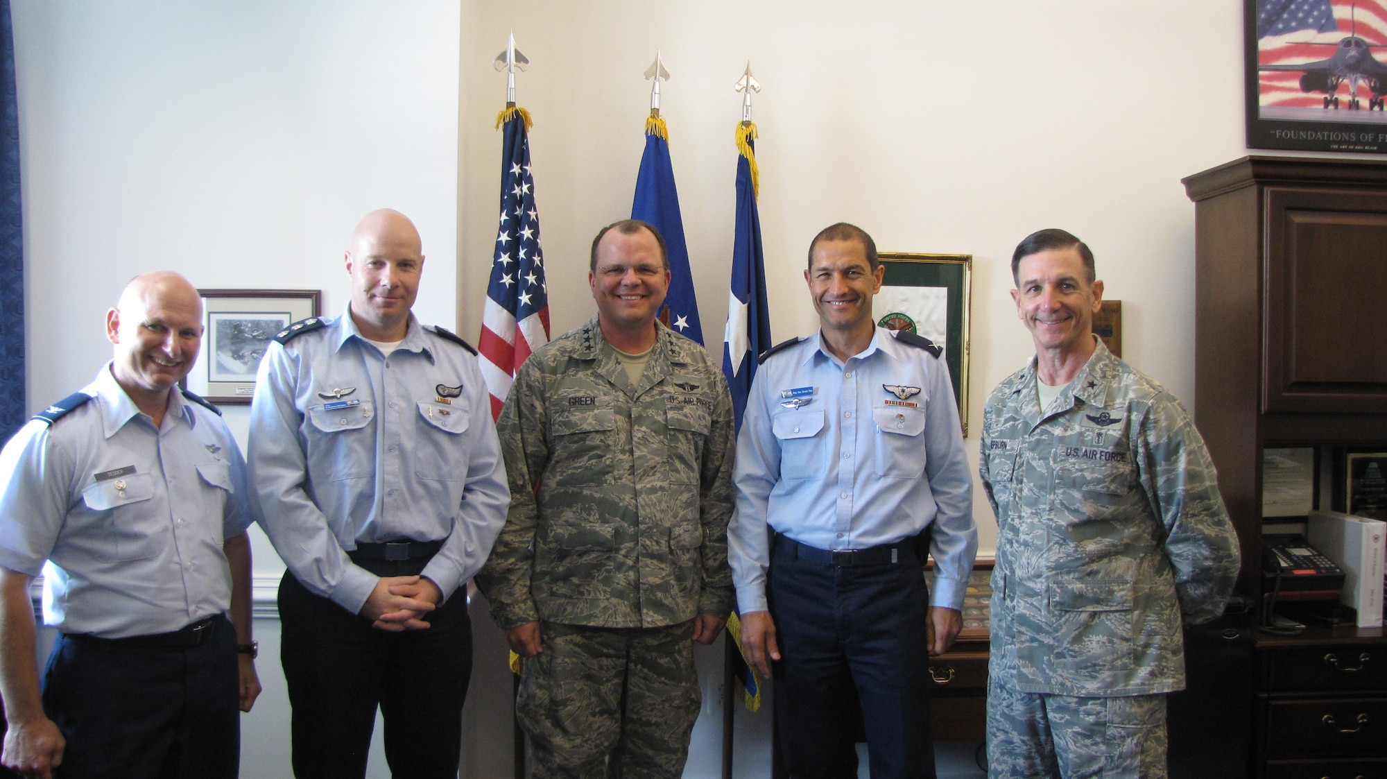 Officials with the Israeli Defense Force met with Air Force Medical Service officials in Washington in early June.  Topics included formalizing partnerships and collaboration in casualty care and trauma training; flight surgeon exchange programs and training courses;  Joint medical exercises (including aeromedical evacuation and Critical Care Air Transport Teams (CCATT) ; and Post-Traumatic Stress disorder prevention.  Pictured from left to right are: -- Col. (Dr.) Chuck Tedder, 3rd AF command surgeon;  Col. (Dr.) Gil Hirschhorn, IDF air force surgeon general; -- Lt. Gen. (Dr.) Charles B. Green, Air Force surgeon general; Brig. Gen. Ronen Dan, Israeli air attaché; and Brig. Gen. (Dr.) Byron Hepburn, Air Force deputy surgeon general.  (U.S. Air Force photo by Col. (Dr.) Mylene Huynh)