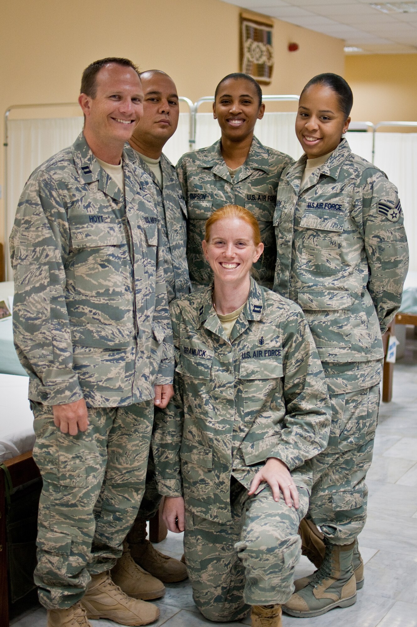 SOUTHWEST ASIA - A 386th Expeditionary Medical Group team lead by Capt. Matthew Hoyt (far left), doctor of osteopathy, was responsible for saving the life of a heart attack victim at an undisclosed base here June 9, 2010, thanks to swift ation and a newly stocked "clot-busting" medication. Other members of the life-saving team were (standing, left to right) Tech. Sgt. Kenneth Garlough, non-commissioned office in charge; Senior Airman Yaneesa Simpson, medical technician; Senior Airman Ramarah Lilavois, medical  technician; and (kneeling) Capt. Nicole Gramlick, nurse. (U.S. Air Force photo by Maj. Dale Greer/Released)