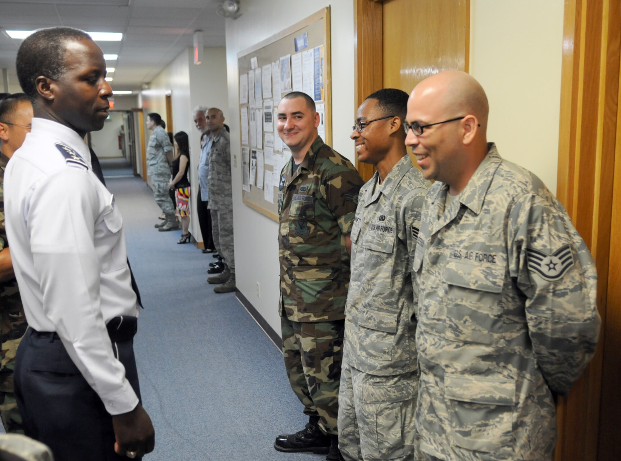 Lt. Gen. Edward Rice Jr., U.S. Forces Japan and 5th Air Force commander, talks with Airmen from the 18th Communications Squadron June 30 during a visit to Kadena Air Base, Japan. (U.S. Air Force photo / Staff Sgt. Christopher Hummel)