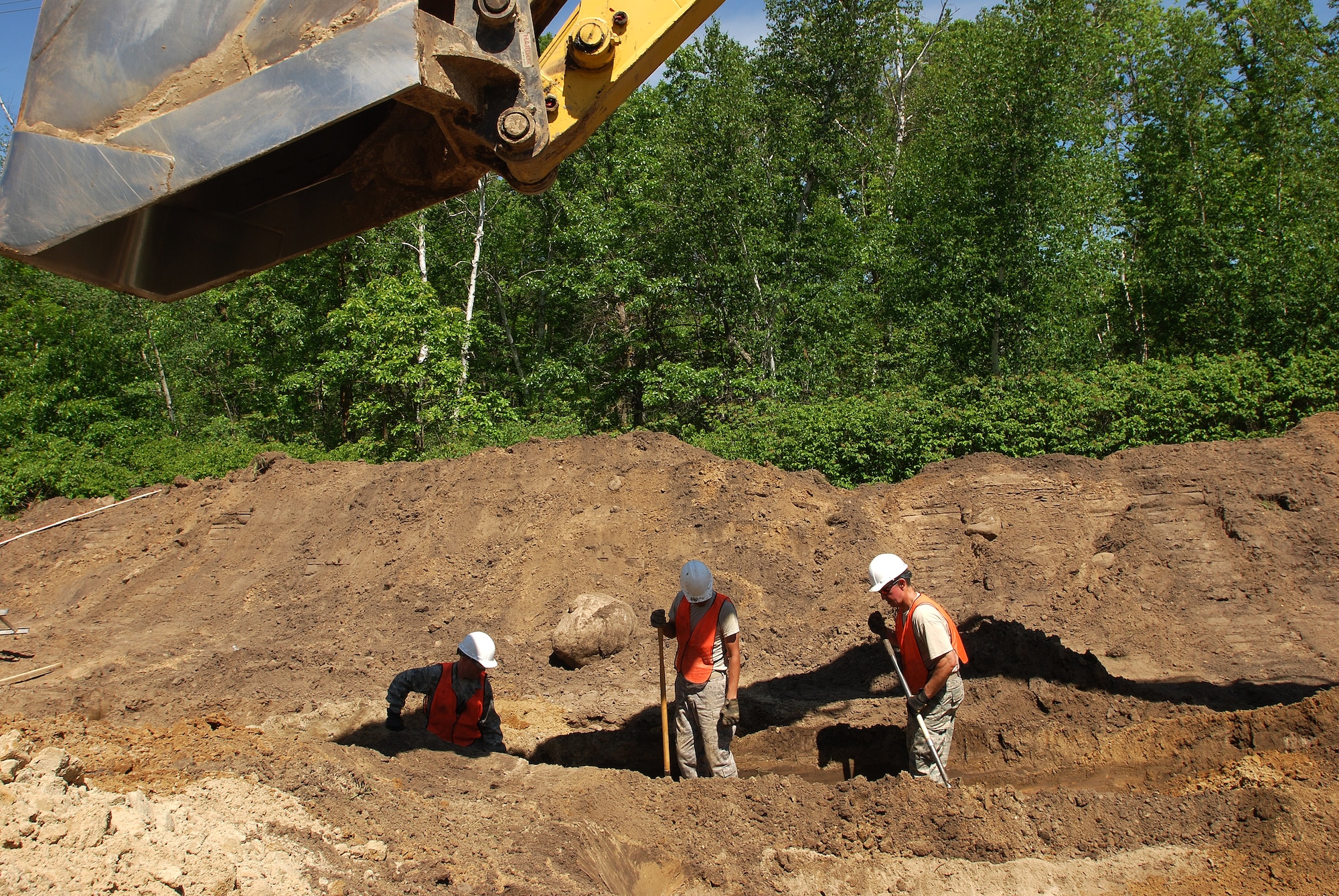 Members of the 433rd Civil Engineering Squadron conduct a humanitarian mission in the Red Lake Indian Reservation for the Red Lake band of Chippewa Indians, just outside of Bemidji, Minnesota. (U.S. Air Force photo/Airman 1st Class Brian McGloin)