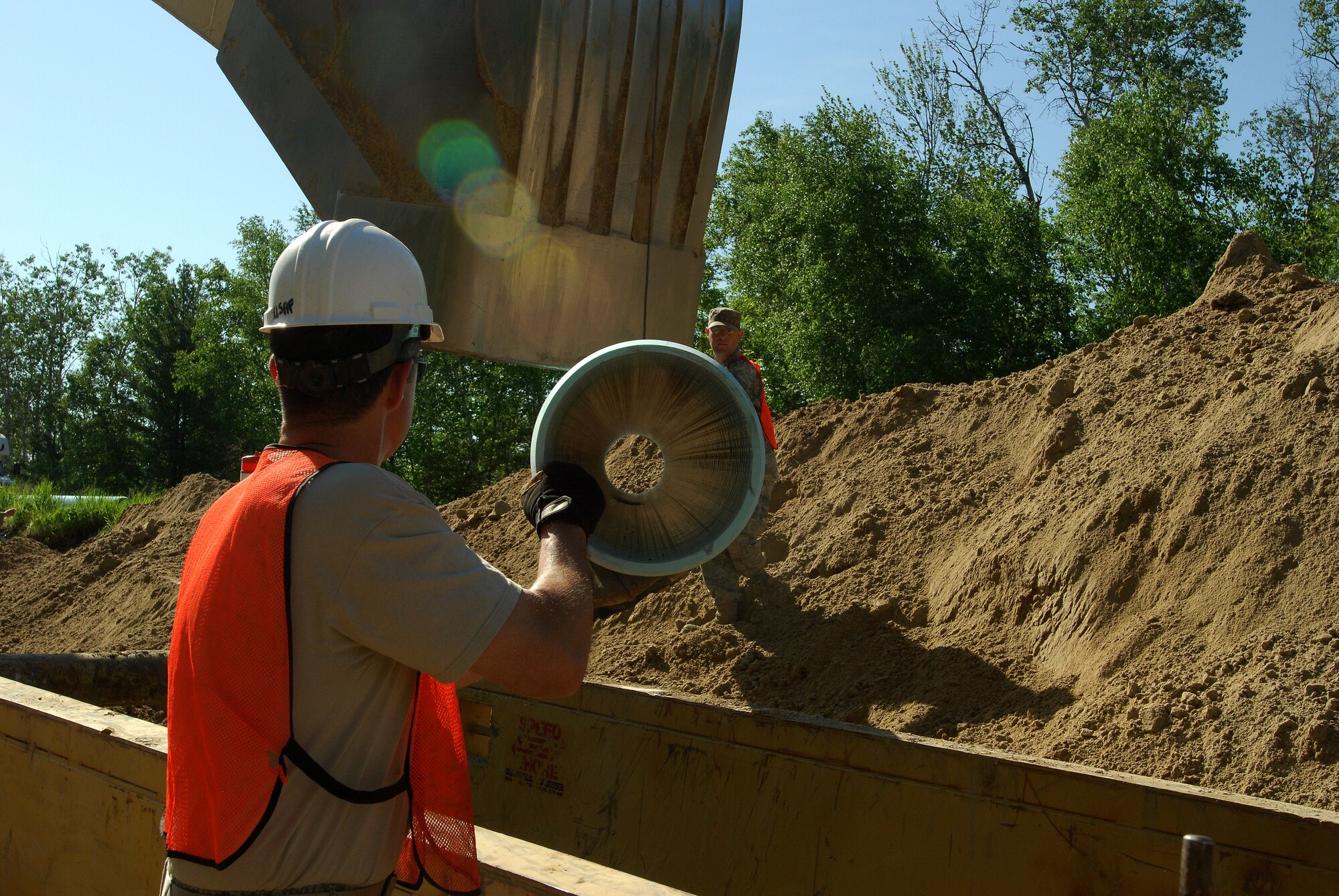 Members of the 433rd Civil Engineering Squadron conduct a humanitarian mission in the Red Lake Indian Reservation for the Red Lake band of Chippewa Indians, just outside of Bemidji, Minnesota. (U.S. Air Force photo/Airman 1st Class Brian McGloin)