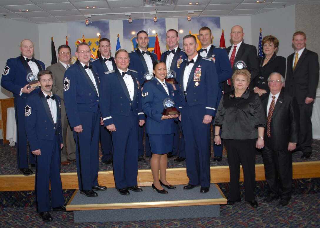 Airmen from the 80th Flying Training were presented awards Feb. 26 during the 80th FTW Annual Awards Ceremony at the Sheppard Club. From left to right (bottom row) are Master Sgt. Scott Turner, sponsor and logistics program manager 982nd Maintenance Squadron; Chief Master Sgt. Norman Thierolf, 80th FTW command chief; Maj. Gen. Maurice Forsyth, guest speaker and Air Education and Training Command LeMay Center commander; Airman of the Year Senior Airman Daynesha Bumanglag, 80th Operations Support Squadron; Col. Kevin Schneider, 80th FTW commander; Jill Patterson, sponsor; and Noros Martin, sponsor. From left to right (top row) are Senior NCO of the Year Master Sgt. Kevin Gallemore, 80th OSS; Civilian Category I of the Year Mark Bice, 80 OSS; Instructor Pilot of the Year Capt. Jacob Hostetler, 459th Flying Training Squadron; Company Grade Officer of the Year Maj. Christopher Breffitt, 459th FTS; Field Grade Officer of the Year Maj. Kenneth Cook, 459th FTS; Flight commander of the Year Maj. Stephen Fekete, 89th FTS; Civilian Category II of the Year David Nelson, 80th FTW; Dee Ann Martin, sponsor; and Darren Davis, sponsor.Not Pictured are NCO of the Year Tech. Sgt. Kenyun Willis, 80th FTW, and Civilian Category II of the Year Pamela Glendening, 80th Operations Group. 