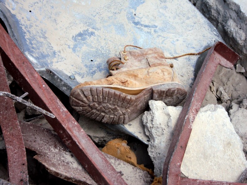 A single shoe lies among the ruins of Hotel Montana. (Courtesy photo)