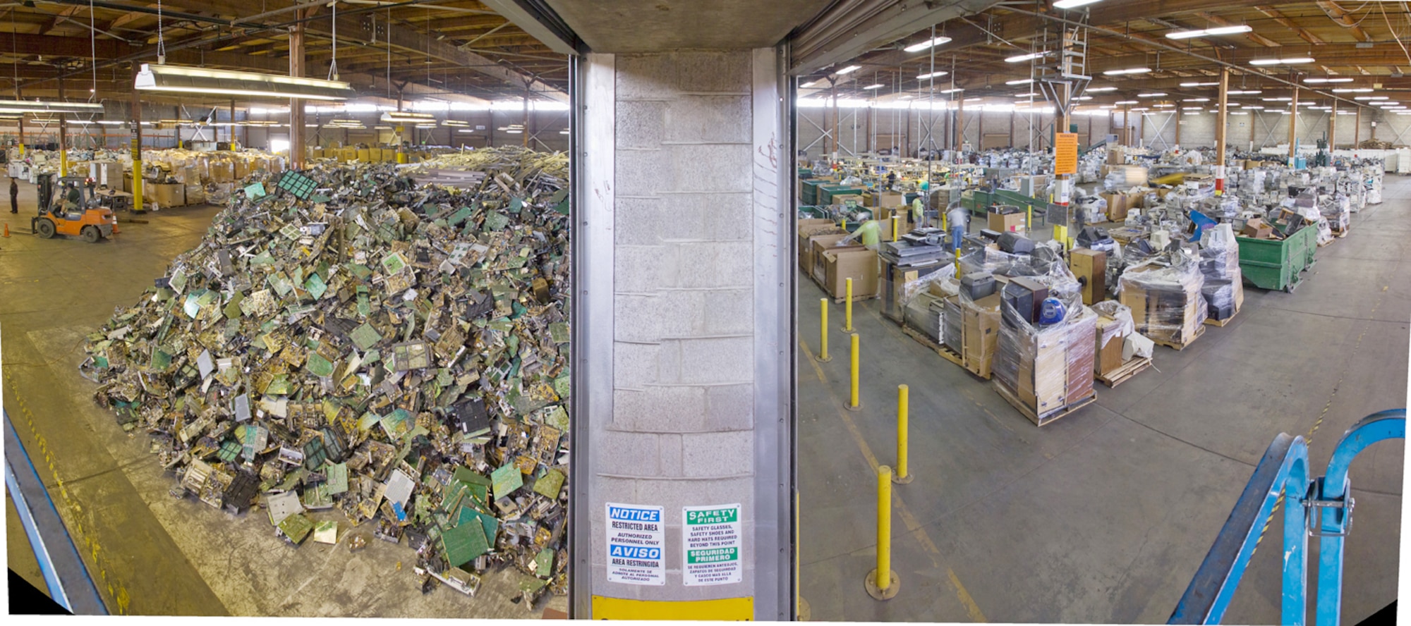 Piles of used computer parts are waiting to be recycled at California Electronic Asset Recovery at the former Mather Air Force Base in Sacramento, Calif. CEAR workers recycled more than 15 million pounds of e-waste last year. (Courtesy photo)