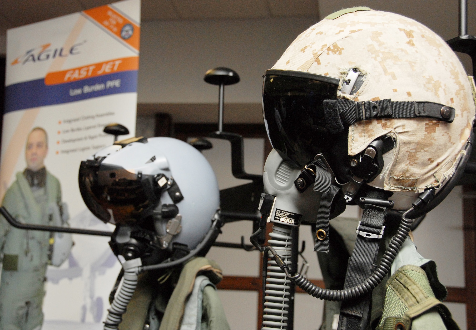 Legacy flight suits were displayed as Air Force, Navy and Marine pilots were fitted for the first F-35 Lightning II joint strike fighter equipment Feb. 25, 2010, at Eglin Air Force Base, (U.S. Air Force photo/Airman 1st Class Anthony Jennings)