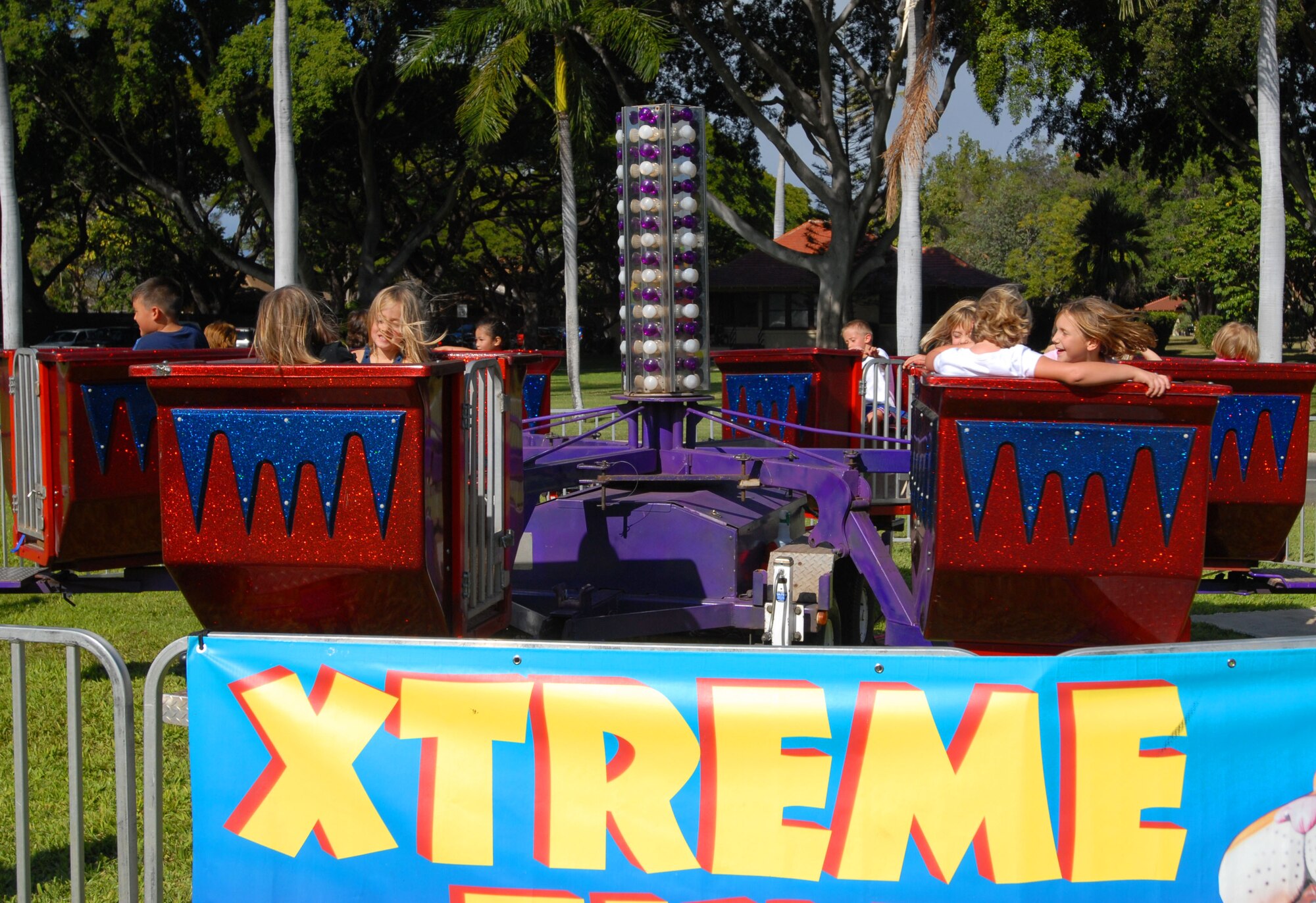 JOINT BASE PEARL HARBOR HICKAM, Hawaii - Kids enjoy a ride in the Turbo Tubs during Mahalo Fest here, Feb. 26. Mahalo Fest was hosted by the 15th Services Squadron marketing team in support of customer appreciation week. (U.S. Air Force photo/Senior Airman Gustavo Gonzalez)